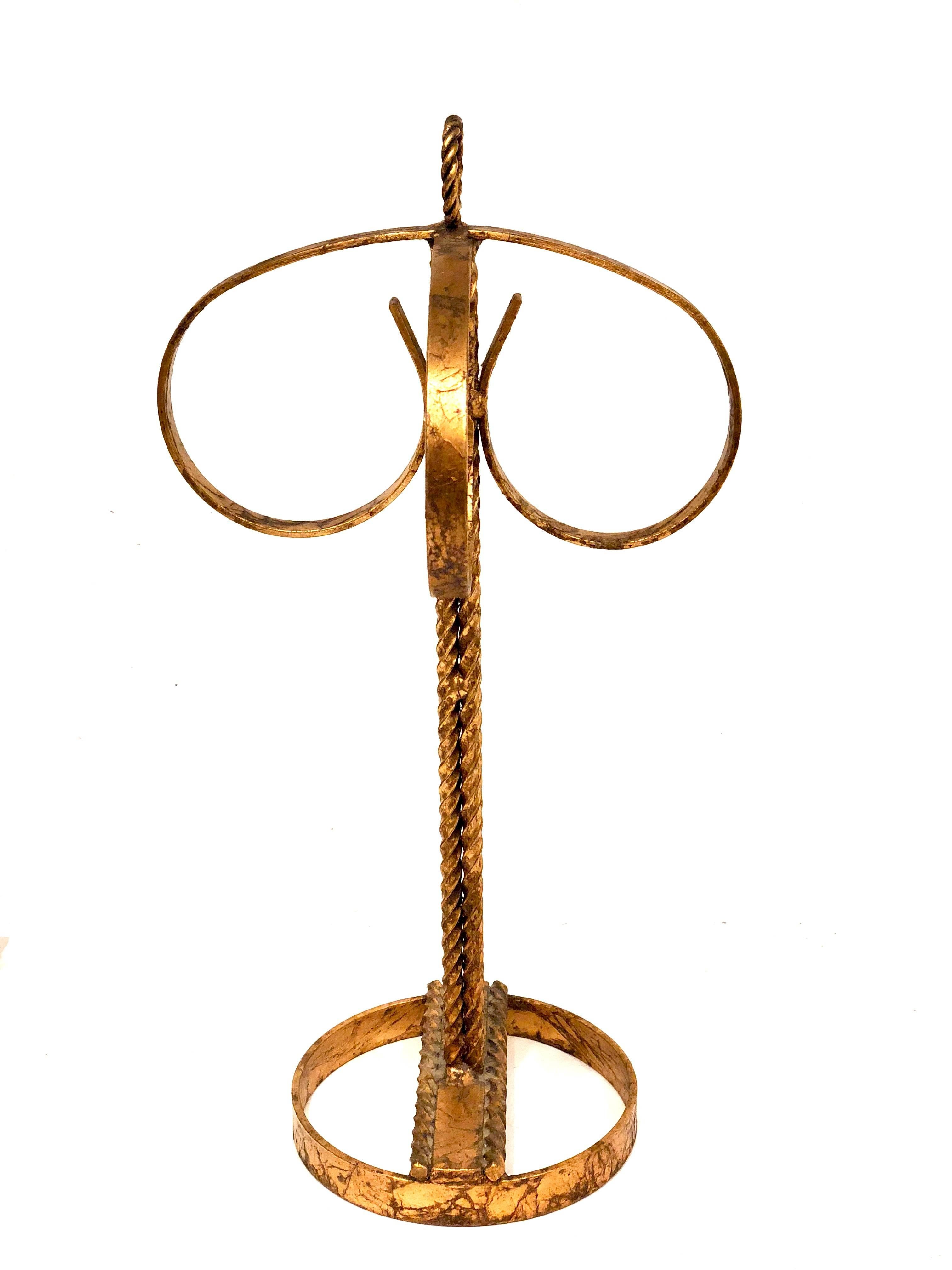 Elegant Italian gold guild towel holder, circa 1950's in excellent condition with 4 towels rings.