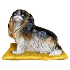 Hollywood Regency Italiano  Perro Spaniel de terracota mayólica sobre almohada