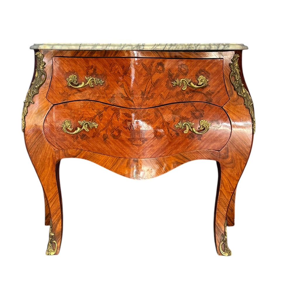 A great Italian regency cabinet circa 1960's. It features a heavy marble top, two drawers with brass accents.