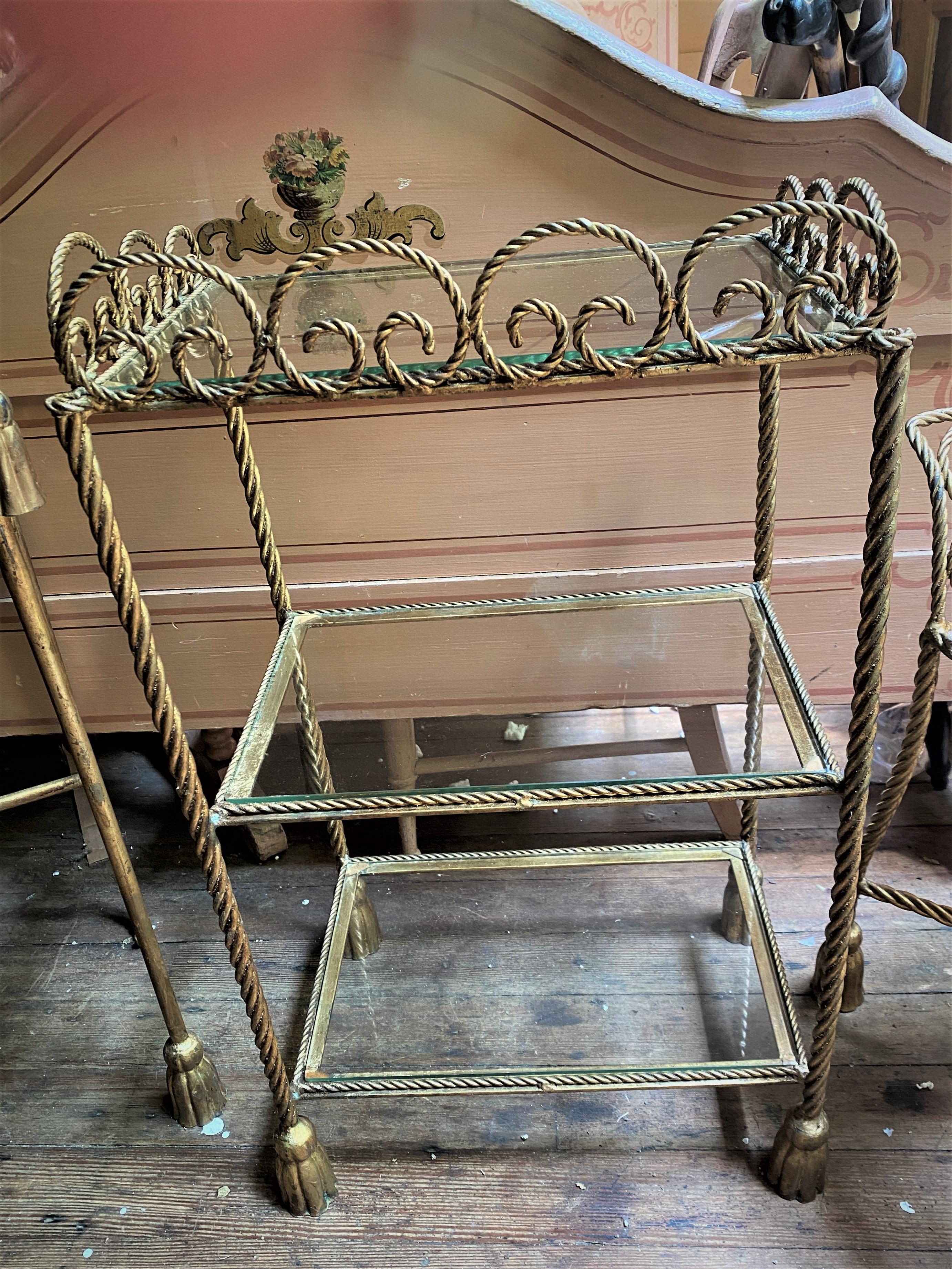 This set of glass and gold colored metal shelves is as sweet as can be! It has a classy twisted rope outline and scroll work top and fun faux tassel feet, just imagine it filled with your perfume bottles, brushes, combs and accessories! I have other