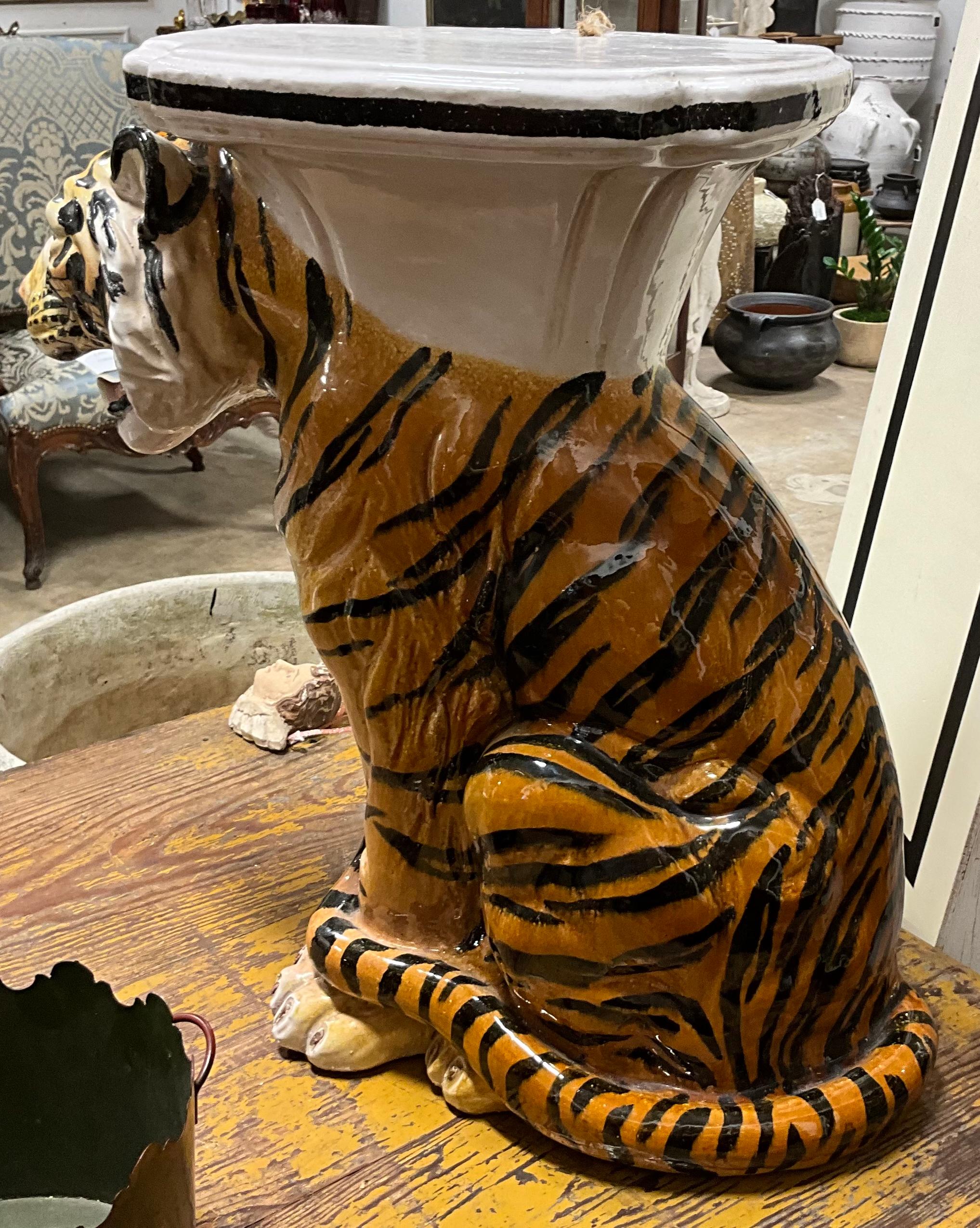 This is a fantastic Hollywood Regency Italian tiger form garden seat. He is terracotta with a vivid majolica glaze. He is in very good condition.
