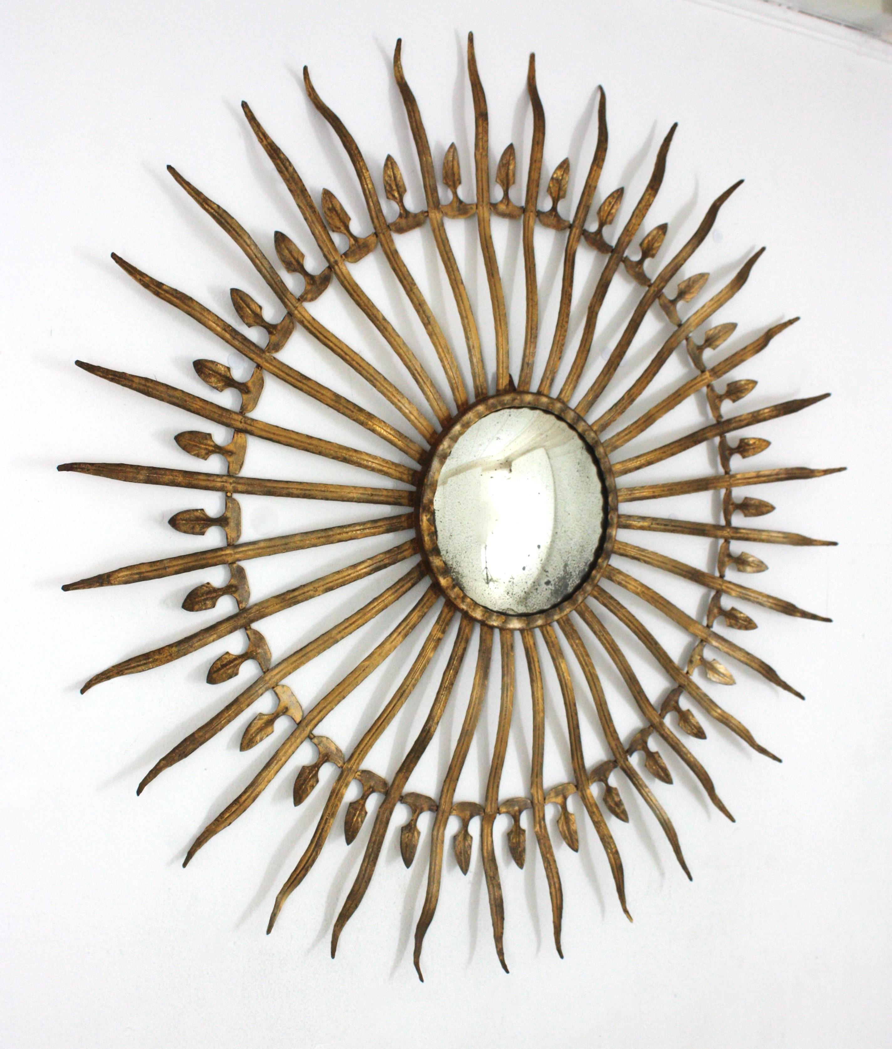 Mid-Century Modern Hollywood Regency Large Convex Starburst Sunburst Mirror in Gilt Iron For Sale