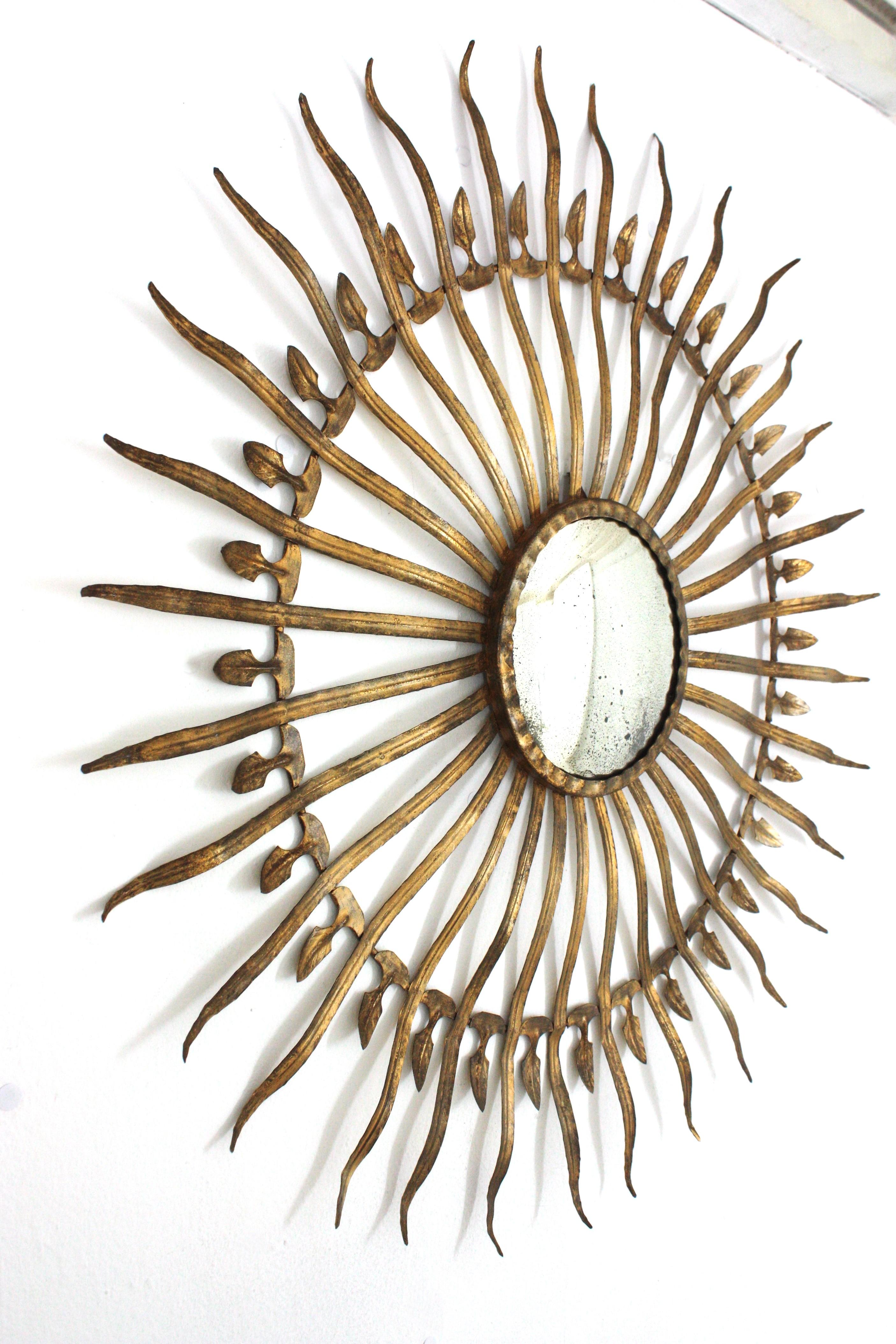 Spanish Hollywood Regency Large Convex Starburst Sunburst Mirror in Gilt Iron For Sale