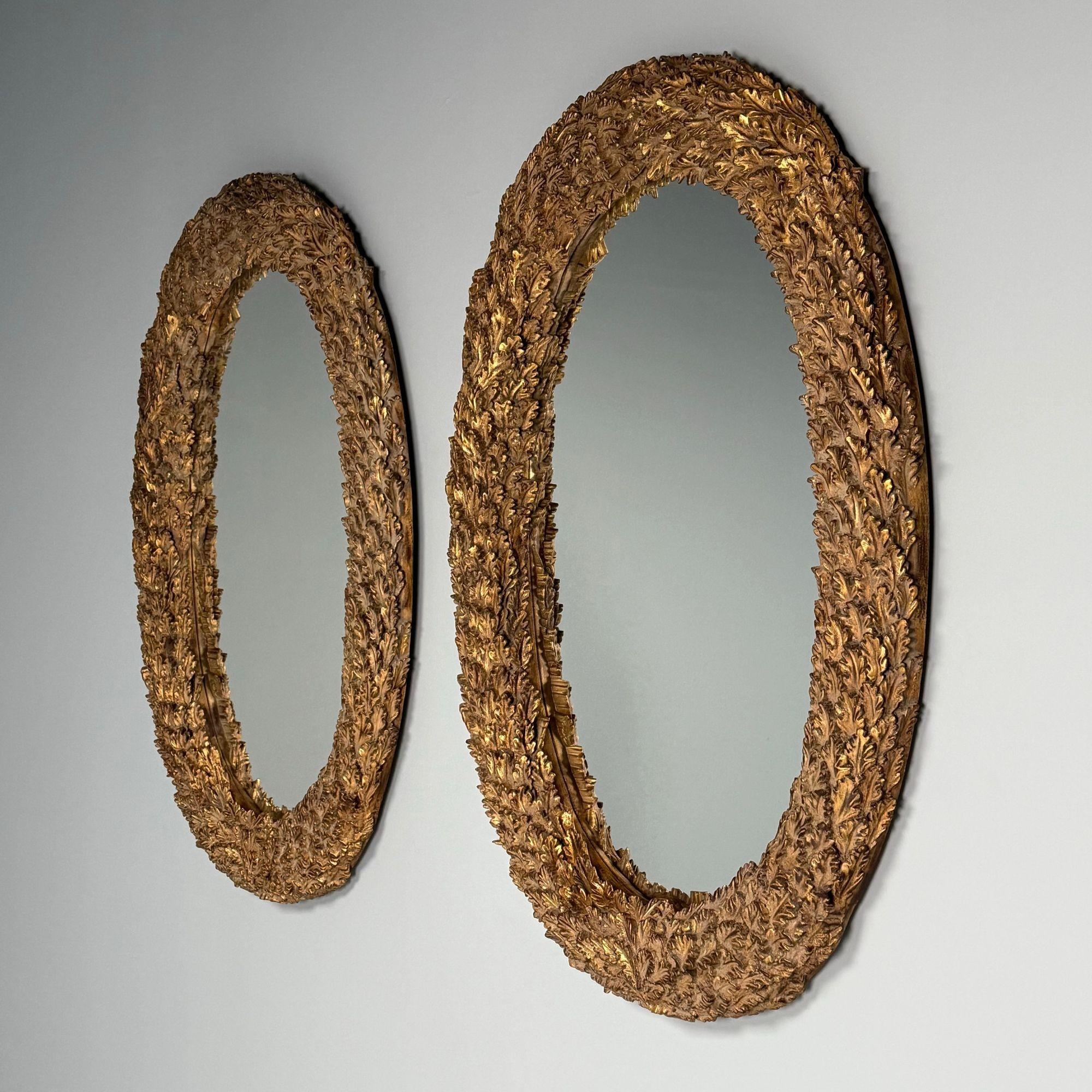 Américain Grands miroirs muraux ovales Hollywood Regency, bois doré sculpté et motif de feuilles, 21e siècle en vente