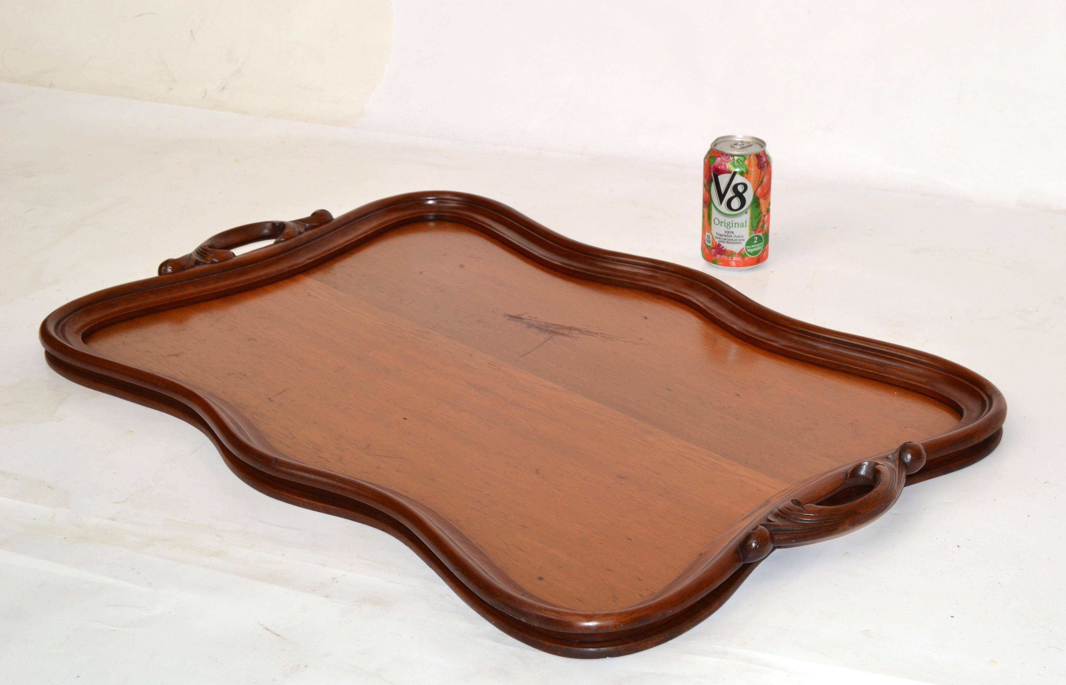 Hollywood Regency large rustic Serving Tray, Platter, Barware hand-carved out of solid wood.
Easy to carry due to the two handles and note the details.
Made in America in the late 20th century.
In original condition with some scratches due to