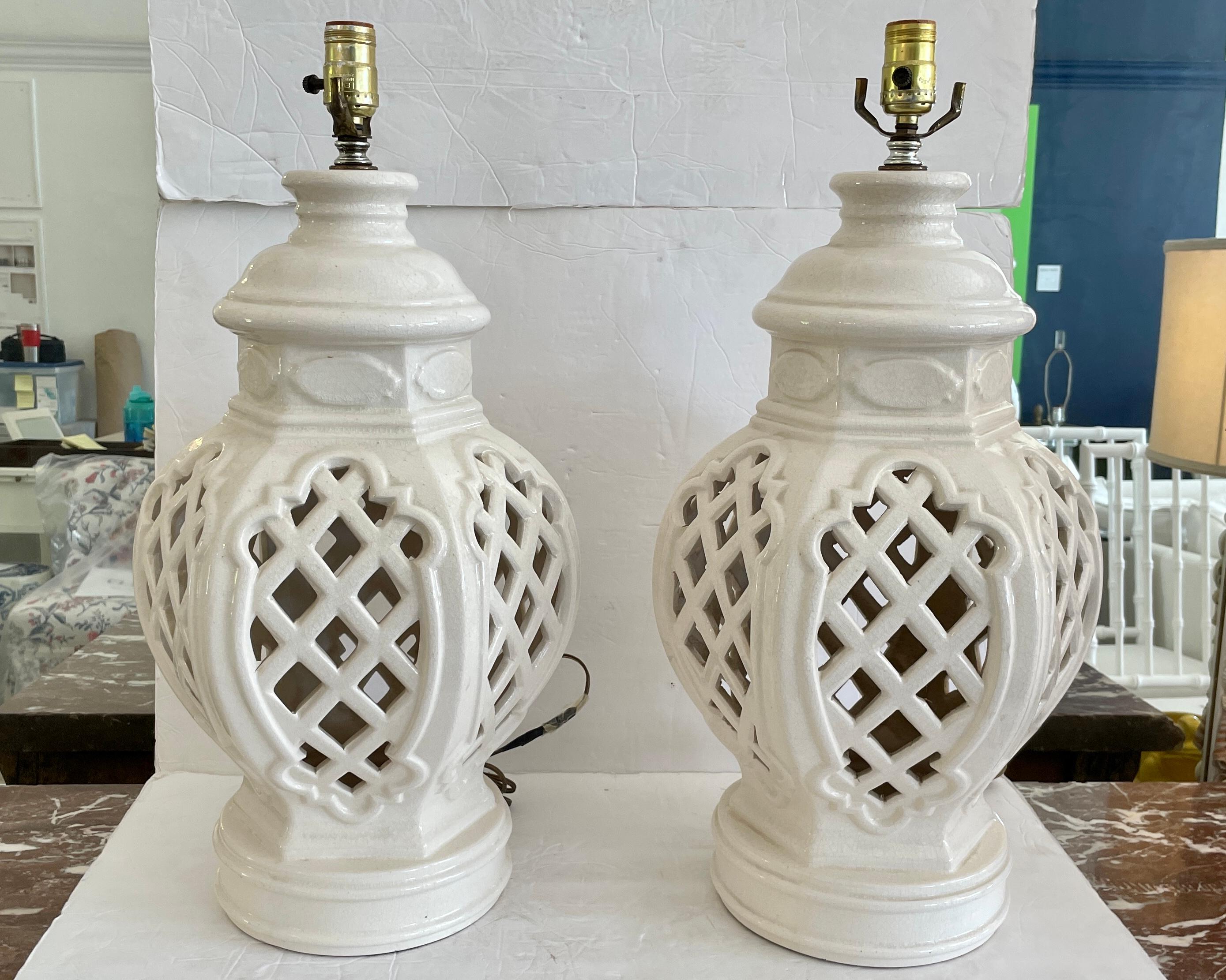 Fun pair of glazed ceramic ginger jar table lamps. Classic ginger jar shape for your interiors and table tops. Just add finials and shades of your choice.