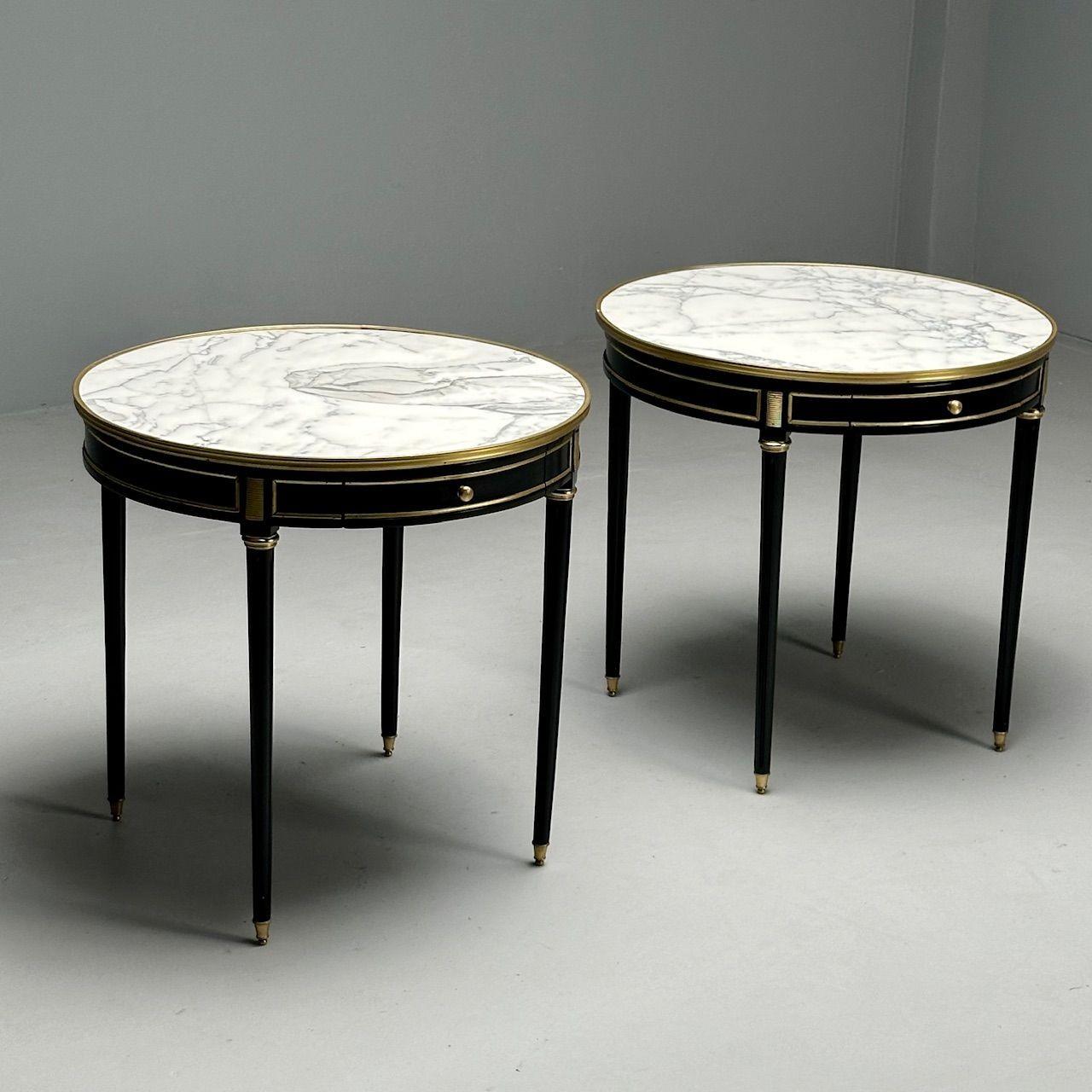 Hollywood Regency, Louis XVI, Maison Jansen Style, Bouiliotte Side or End Tables, Black Paint, Bronze

Pair of large Hollywood Regency painted bronze mounted side or center tables. Each example having a Louis XVI style form with bronze sabots,