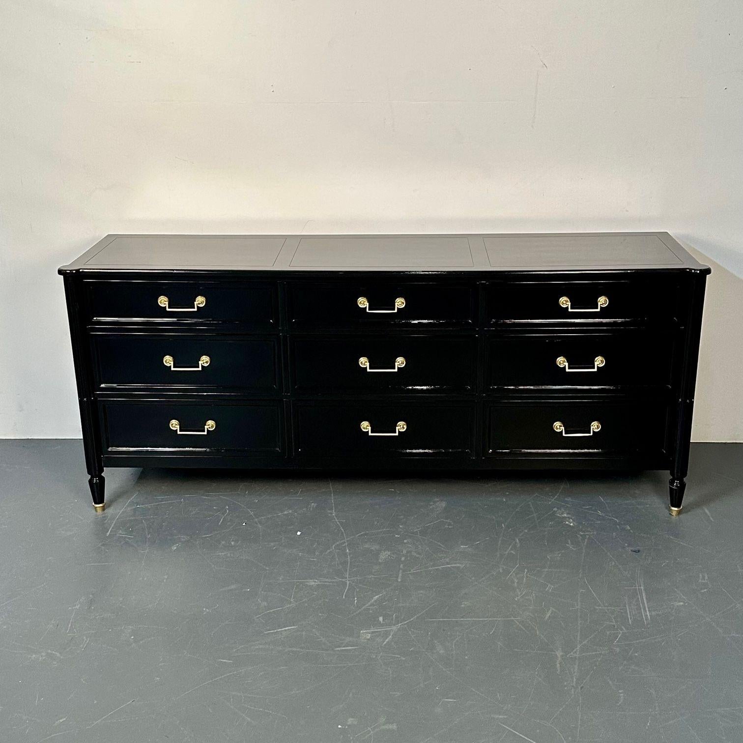 Hollywood Regency Louis XVI Style Ebony Lacquered Dresser / Chest of Drawers
A nine drawer Maison Jansen Style Ebony Dresser or Chest by Milling Road for Baker Furniture Company. Recently refinished and cleaned with solid bronze drawer pulls. An