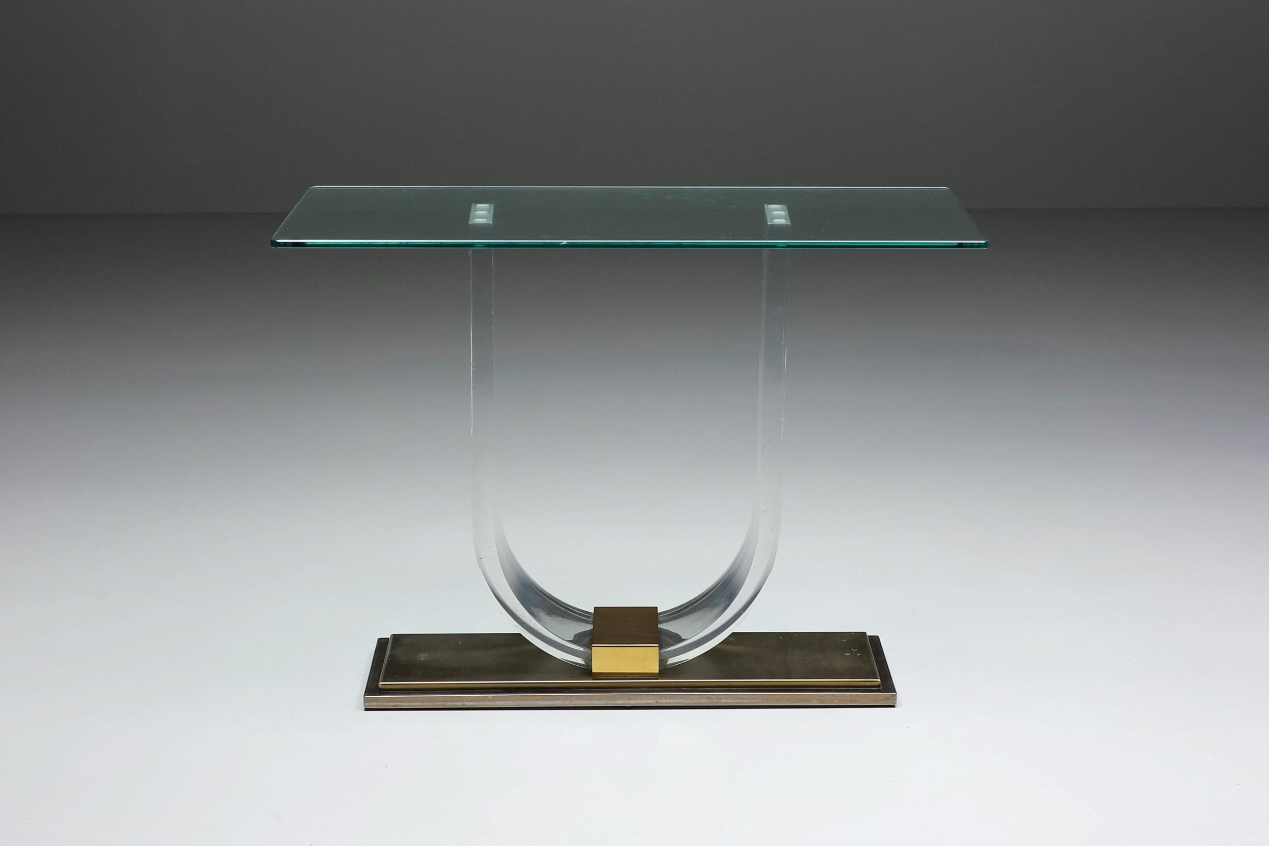 Belgo Chrome; Maison Jansen inspired; French furniture design; Hollywood regency; Brass; Console table; Side table; Wall table; Belgian design; 

This stylish Hollywood Regency Belgochrom console table has a brass base and perspex legs in the shape