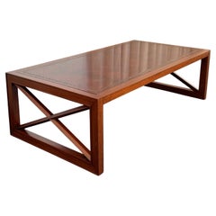 Table basse en acajou et cuir Hollywood Regency