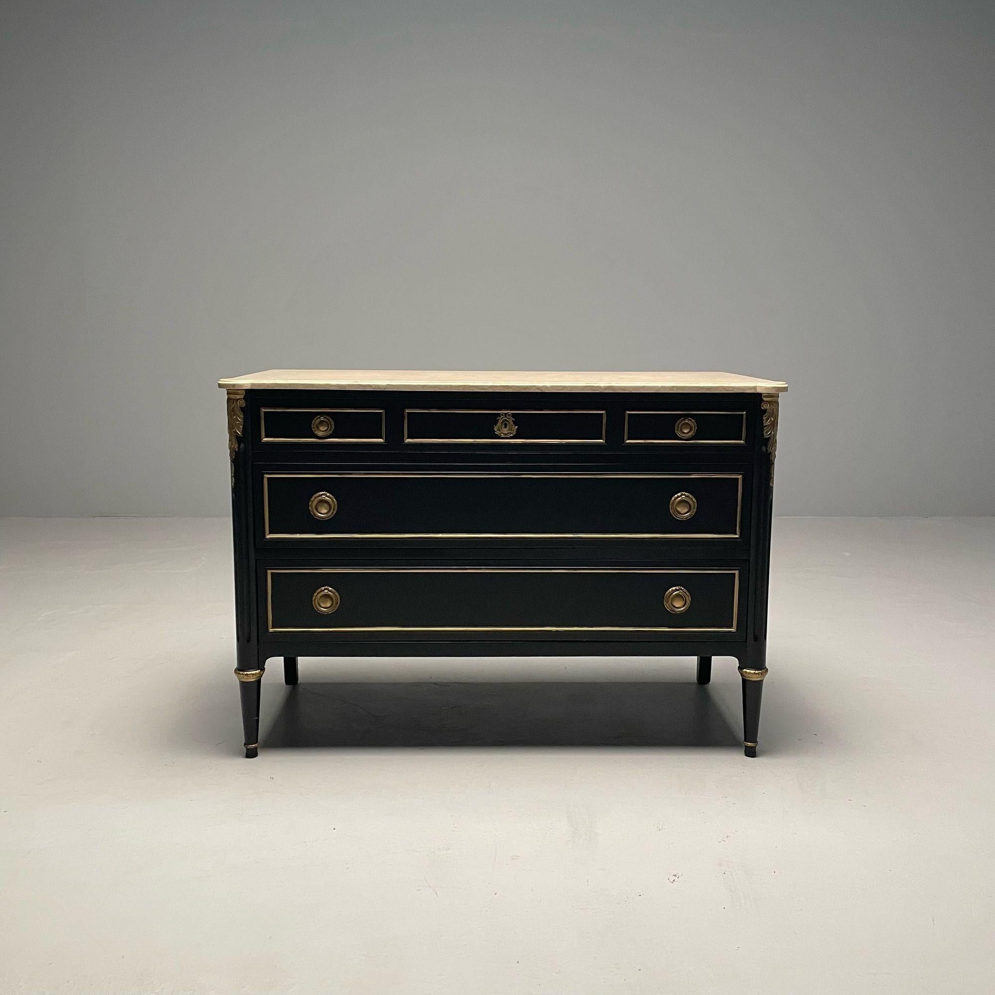 Hollywood Regency Maison Jansen Stamped Ebony Chest / Commode, Marble Top

An ebonized marble-top commode by Maison Jansen. Tapering bronze caped feet supporting a group of three drawers. The secondary woods of solid oak. The exterior of a fine