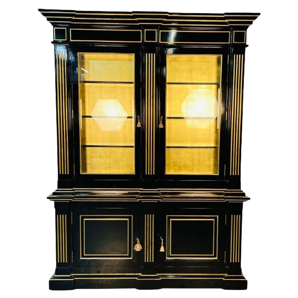 Hollywood Regency Maison Jansen Style Bookcase / Cabinet, Ebony, Gold Leaf For Sale