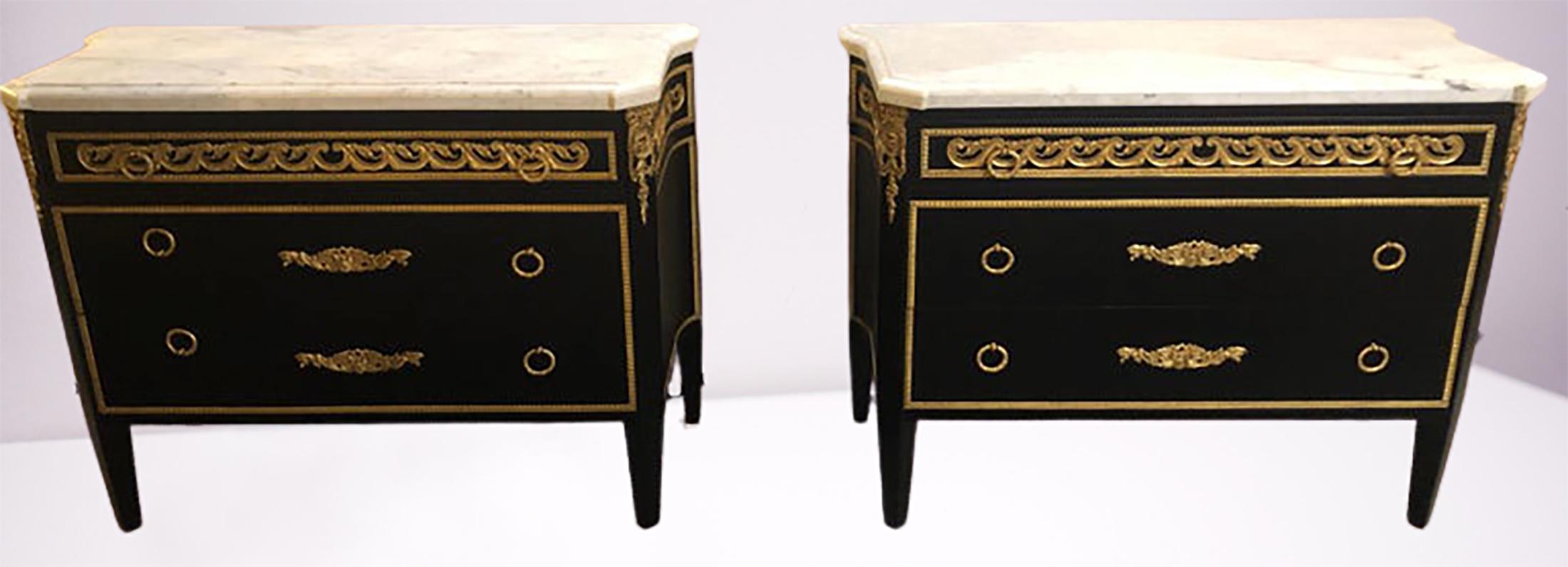 Pair of three graduating drawer Maison Jansen style ebony marble-top bronze-mounted commodes, cabinets, chests or nightstands with concave sides. These simply timeless ebony commodes are impeccably done and compliment this highly sought after