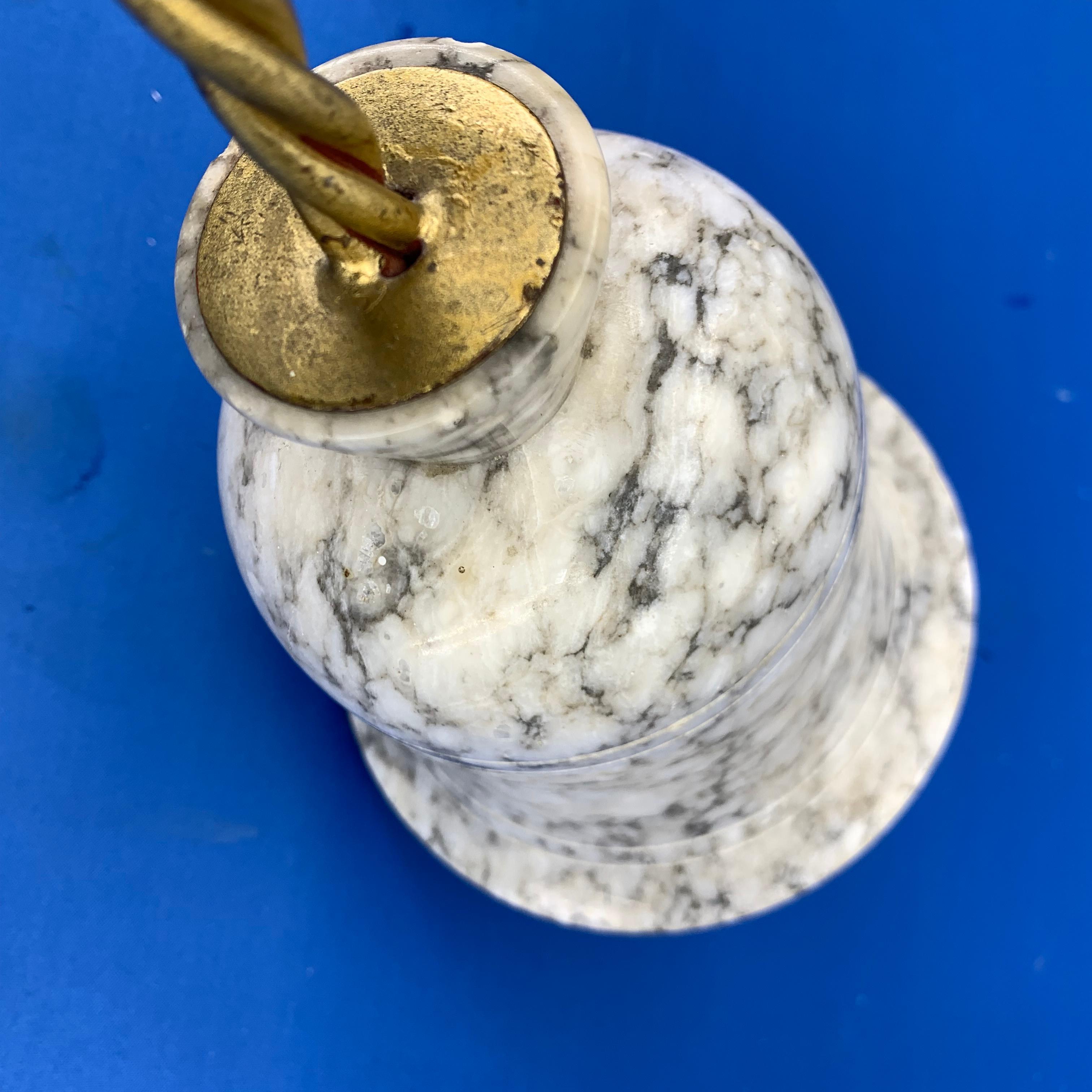 Hollywood Regency Marble and Gilded Roped Metal Doorstop In Good Condition For Sale In Haddonfield, NJ