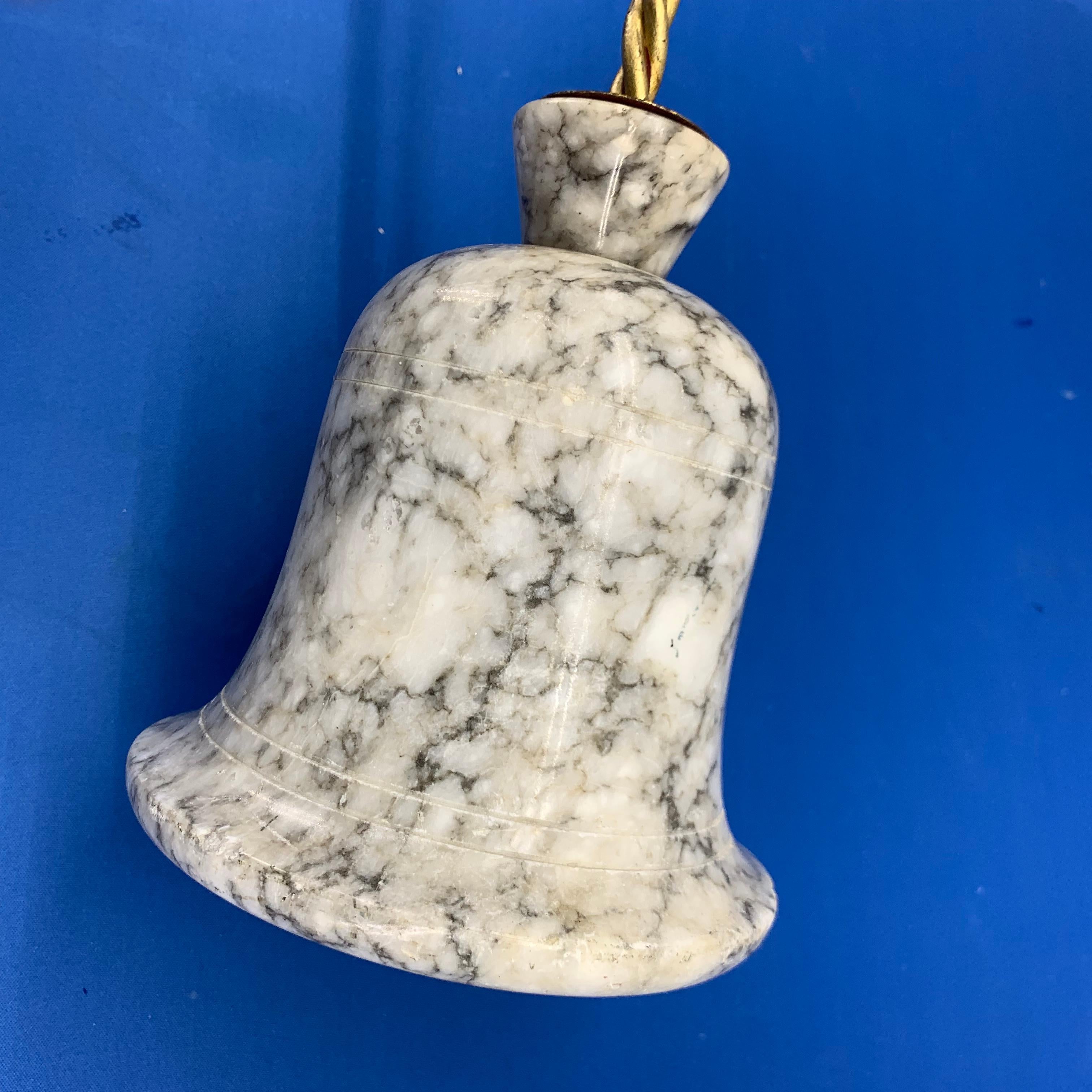 20th Century Hollywood Regency Marble and Gilded Roped Metal Doorstop For Sale