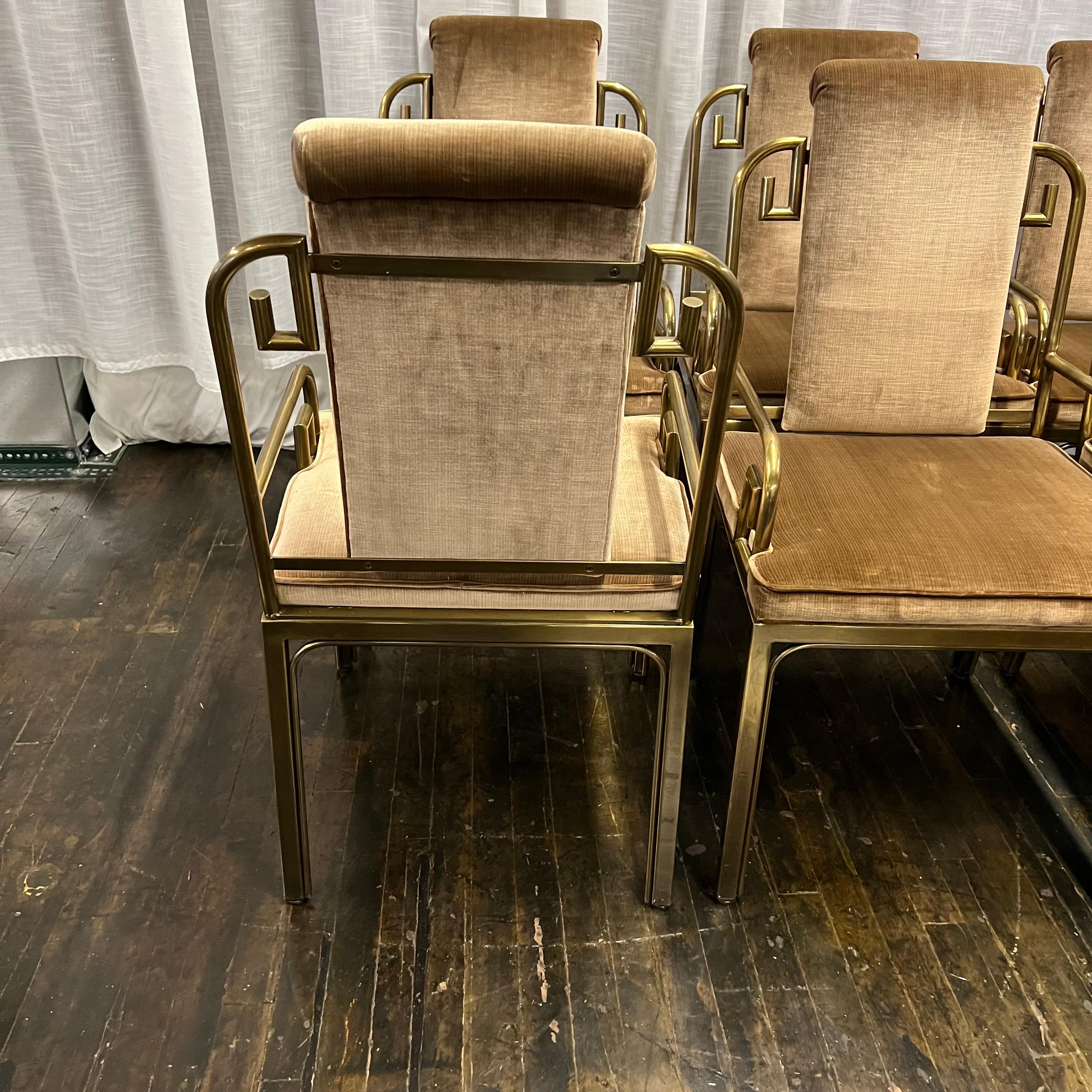 One Mastercraft Hollywood Regency style Greek Key dining chairs with arms designed by Bernhard Rohne.  These chairs are from a North Shore estate.  They have a lovely patina and their velvet upholstery is best described as a cross between a bronze