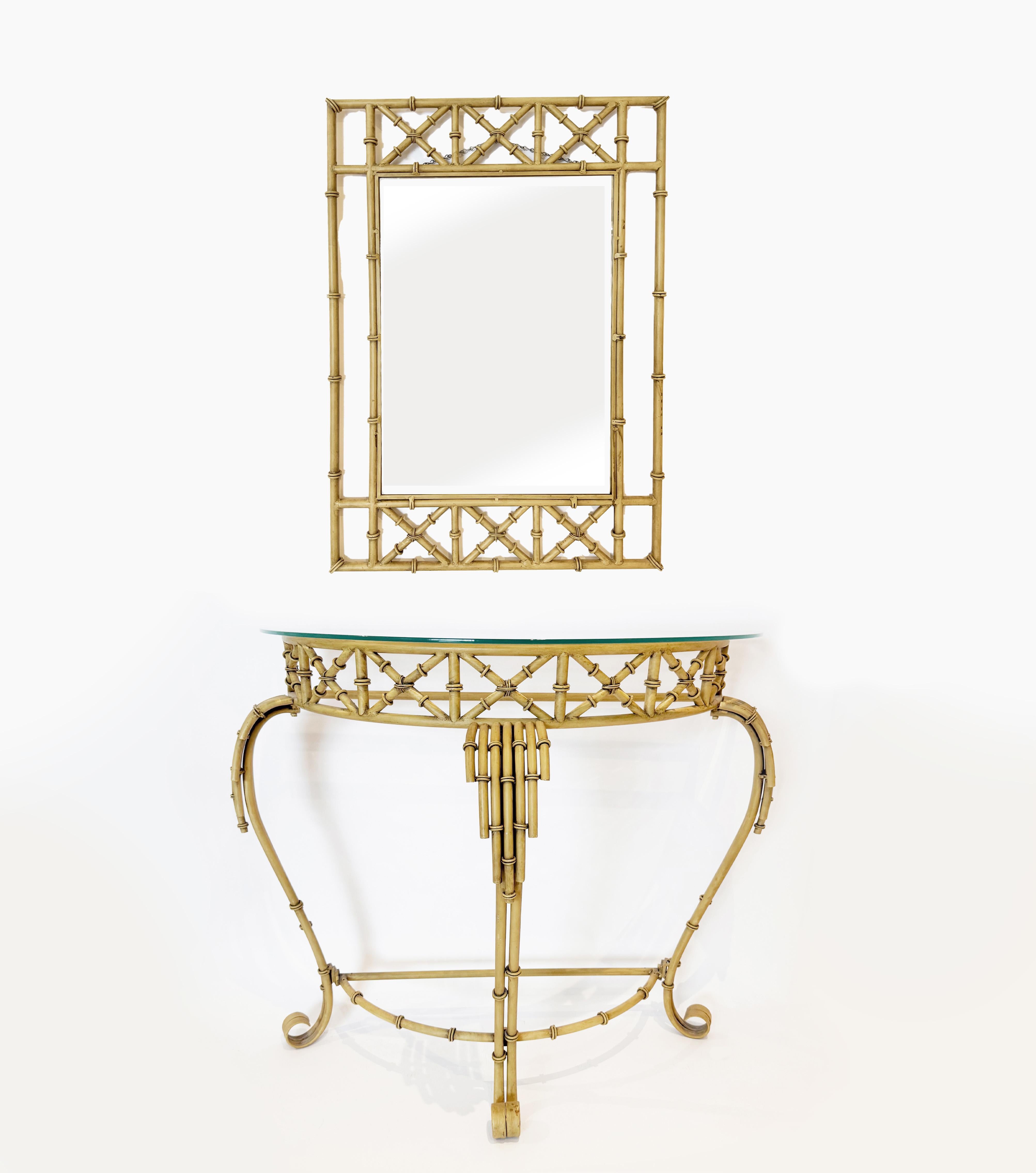 Stunning vintage Hollywood Regency metal faux bamboo demi-lune console table and matching mirror. This eye-catching set captures the era's luxurious, playful style, adding a touch of Palm Beach elegance to any space. The metal base has a matte