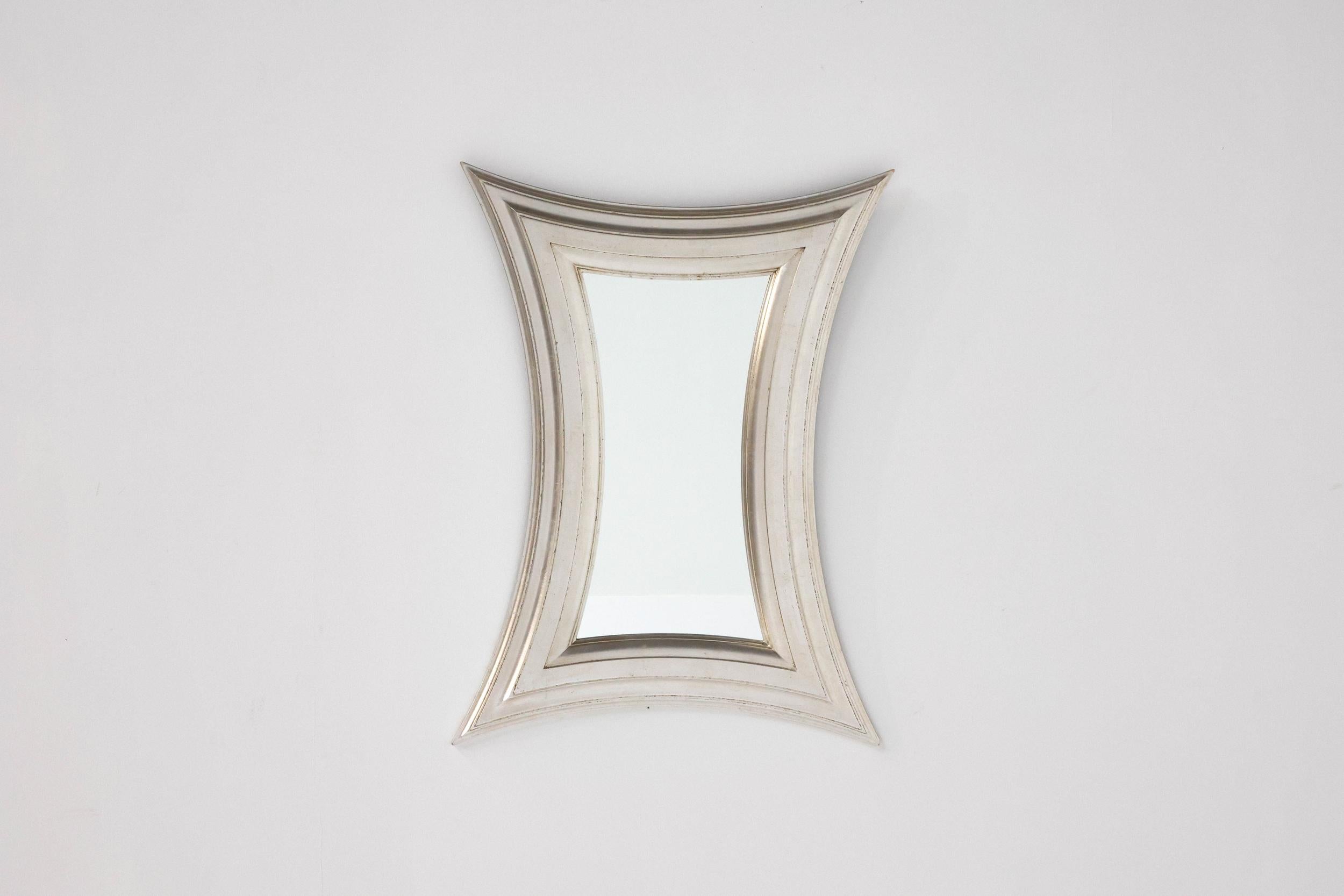 Hollywood Regency; France; mirror; Make-up mirror; Deconstructed; Metal;

Deconstructed organic rectangle mirror with metal frame. Would fit well in a Hollywood Regency-style interior. Has a futuristic and elegant feeling to it.