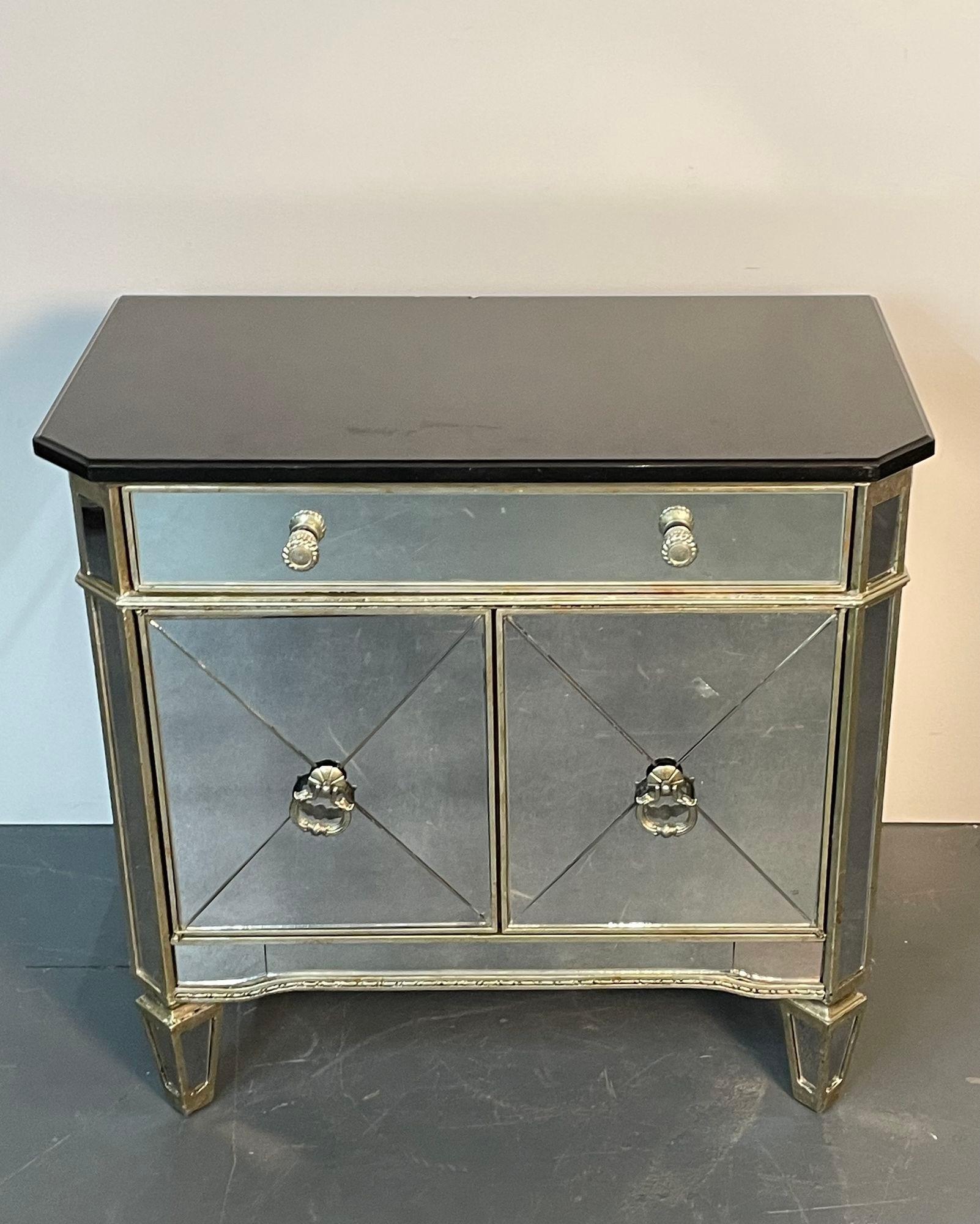 Hollywood Regency Mirrored Granite Top Nightstand, end table.
A fully mirrored and silver gilt end table or nightstand in the modern style. Contemporary. A single drawer above two doors. 
Measures: H29 D17.5 W30.
 