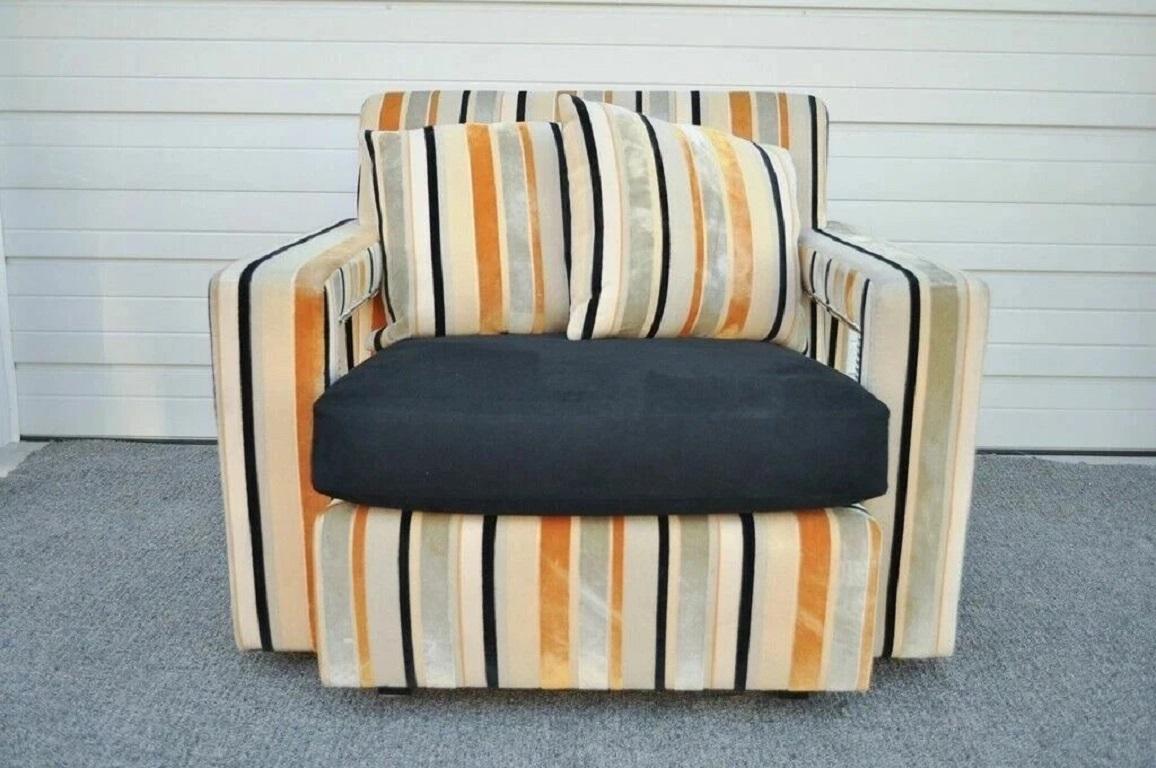 Custom Hollywood Regency Style Modern Striped Upholstered Wide Lounge Club Movie Arm Chair. Item features a very unique oversized frame with striped fabric and 2 removable back pillows. The chair is believed to be custom made by Custom Craft