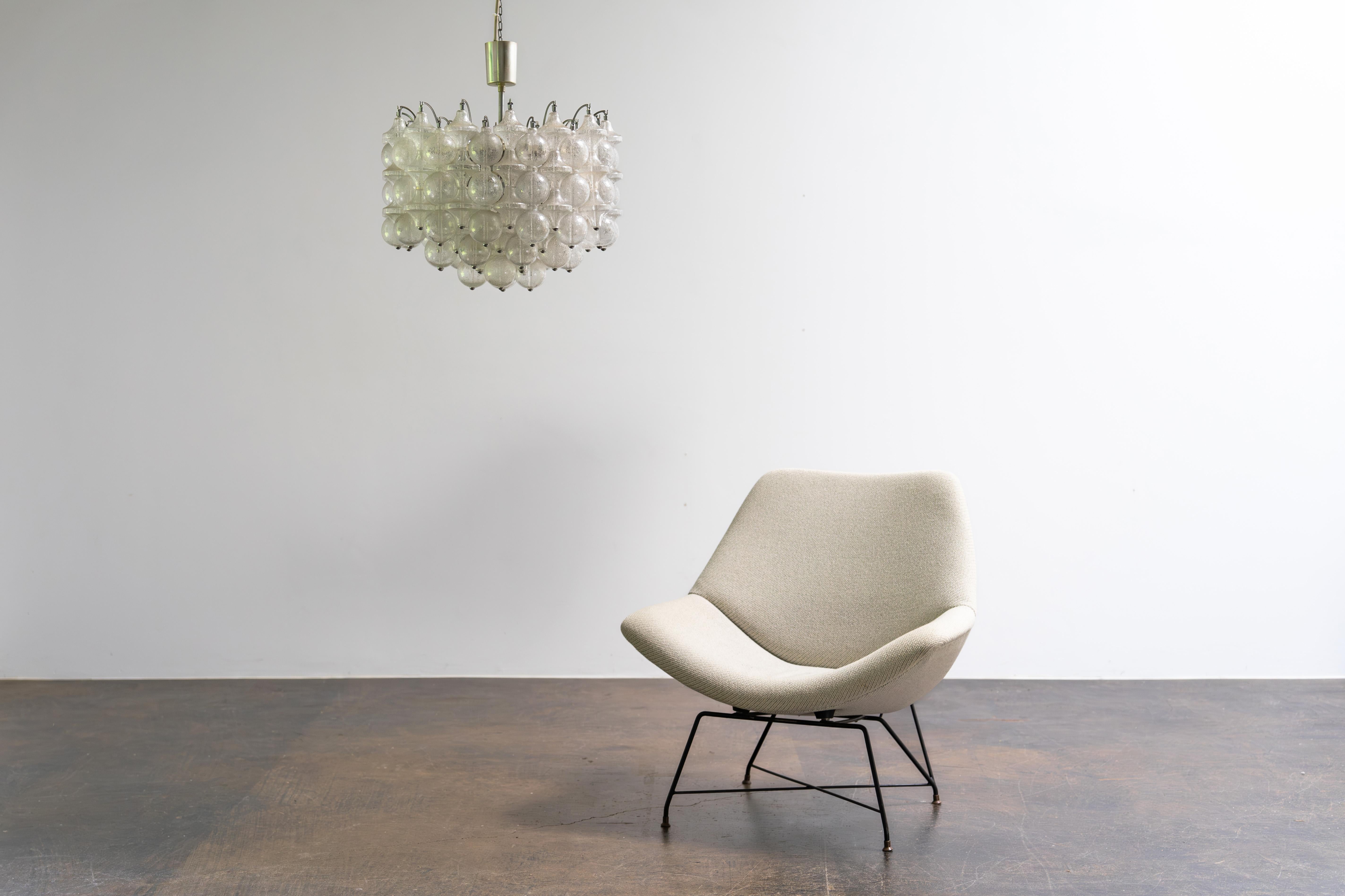 This stunning vintage chandelier by Ott International features 13 E27 light sockets that can be switched in various combinations to create different lighting moods. The design is very similar to the iconic Kalmar Tulipan, also utilizing handcrafted