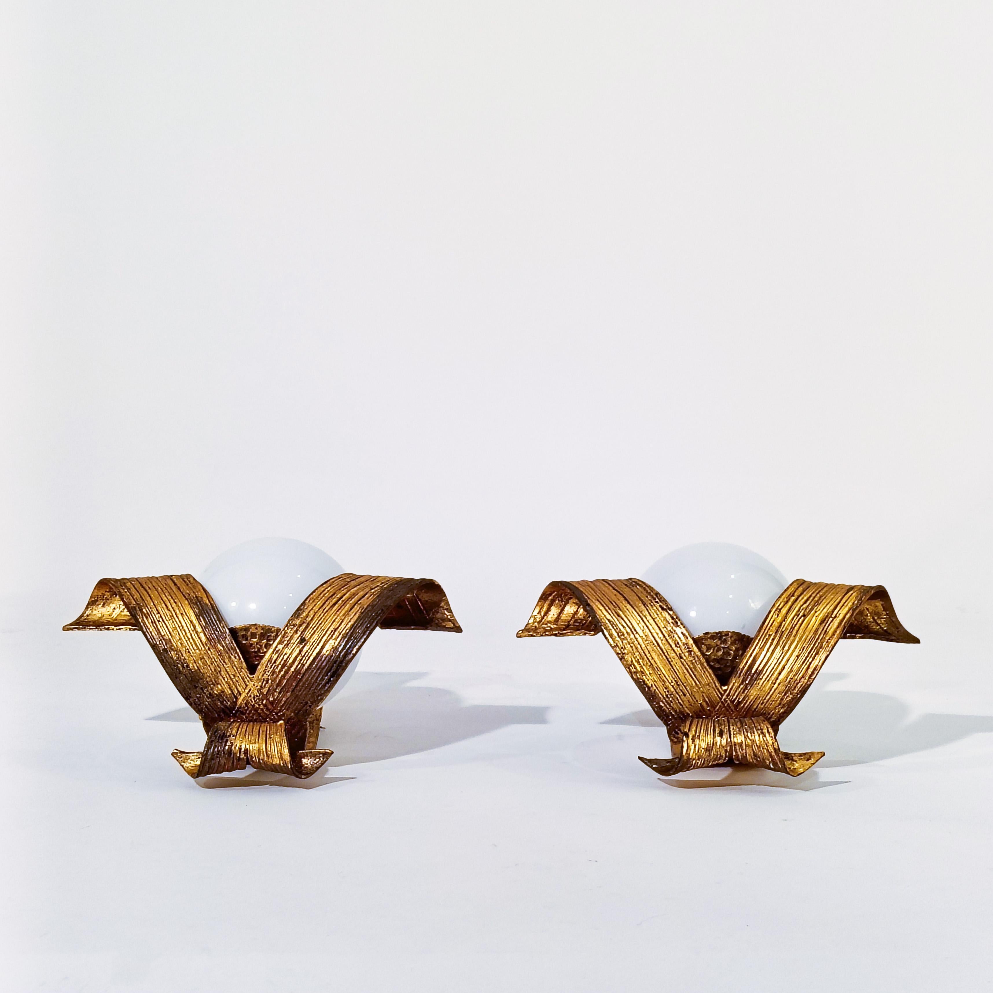 Spanish Hollywood Regency. Neoclassical gilded sconces by Ferro Art, Spain, 1950s For Sale