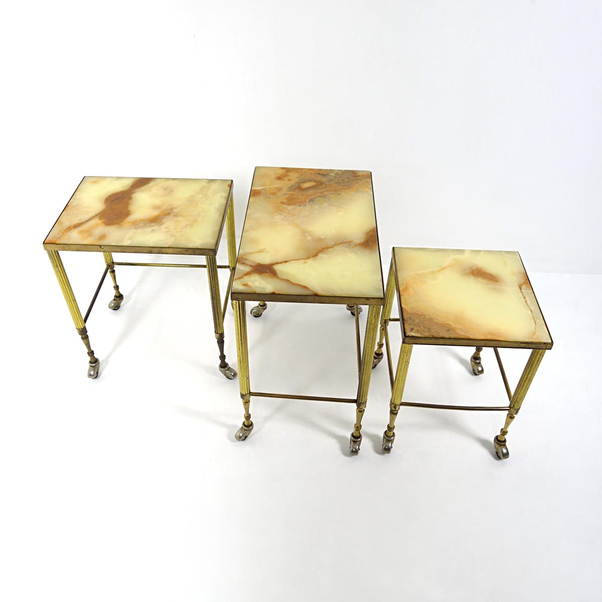 Hollywood Regency Nesting Tables on Wheels Made of Brass With Marble Tops For Sale 1