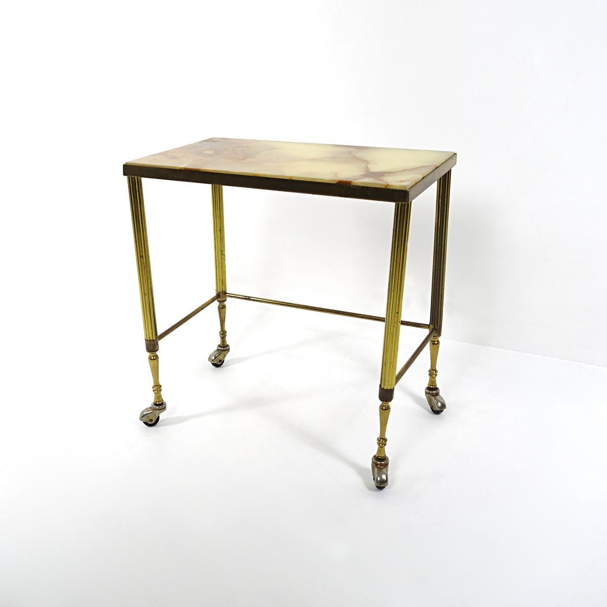 Hollywood Regency Nesting Tables on Wheels Made of Brass With Marble Tops For Sale 4
