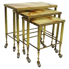 Hollywood Regency Nesting Tables on Wheels Made of Brass With Marble Tops