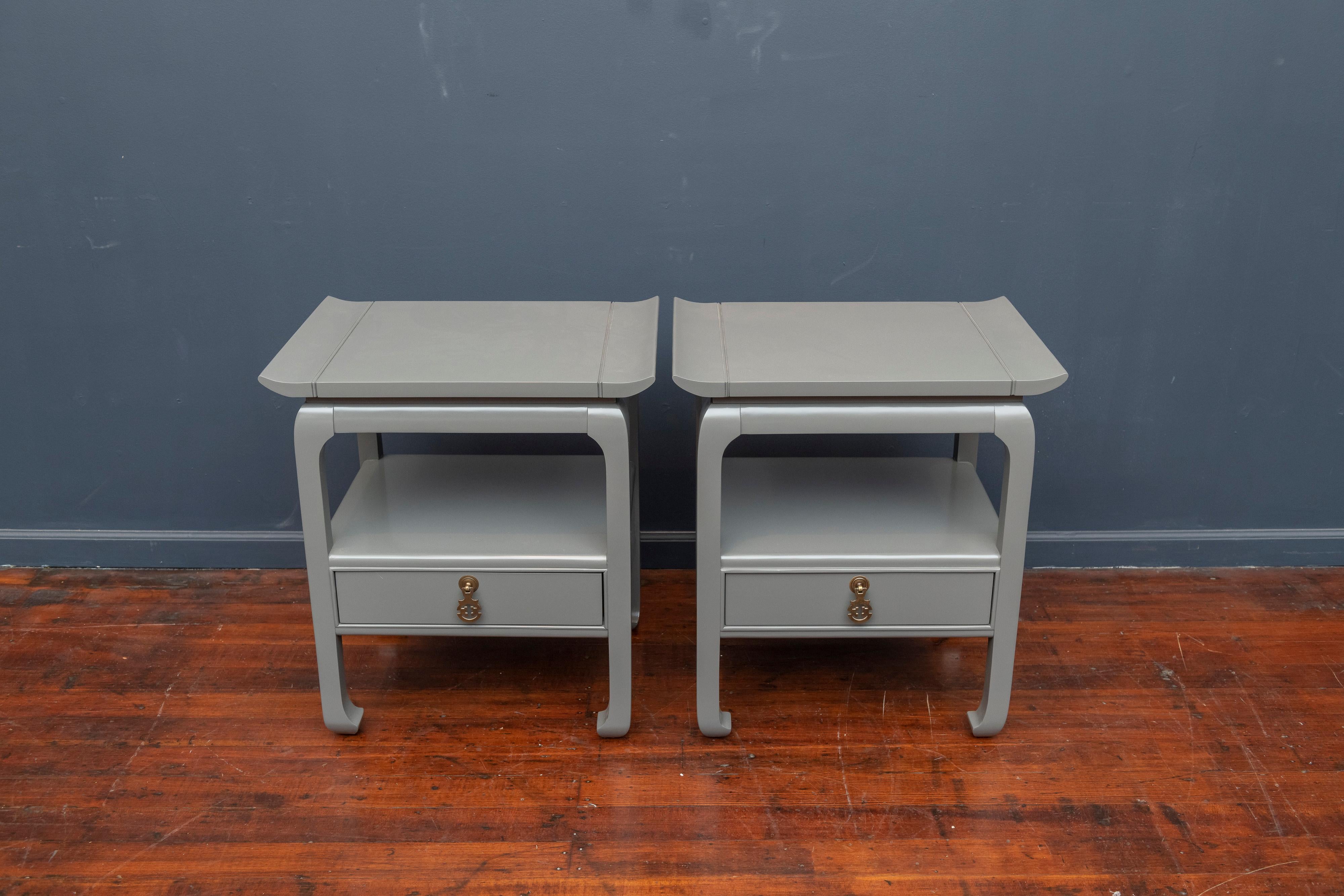 Pair of Hollywood Regency light grey lacquered nightstands or end tables. Solid and well made tables, newly professionally lacquered.