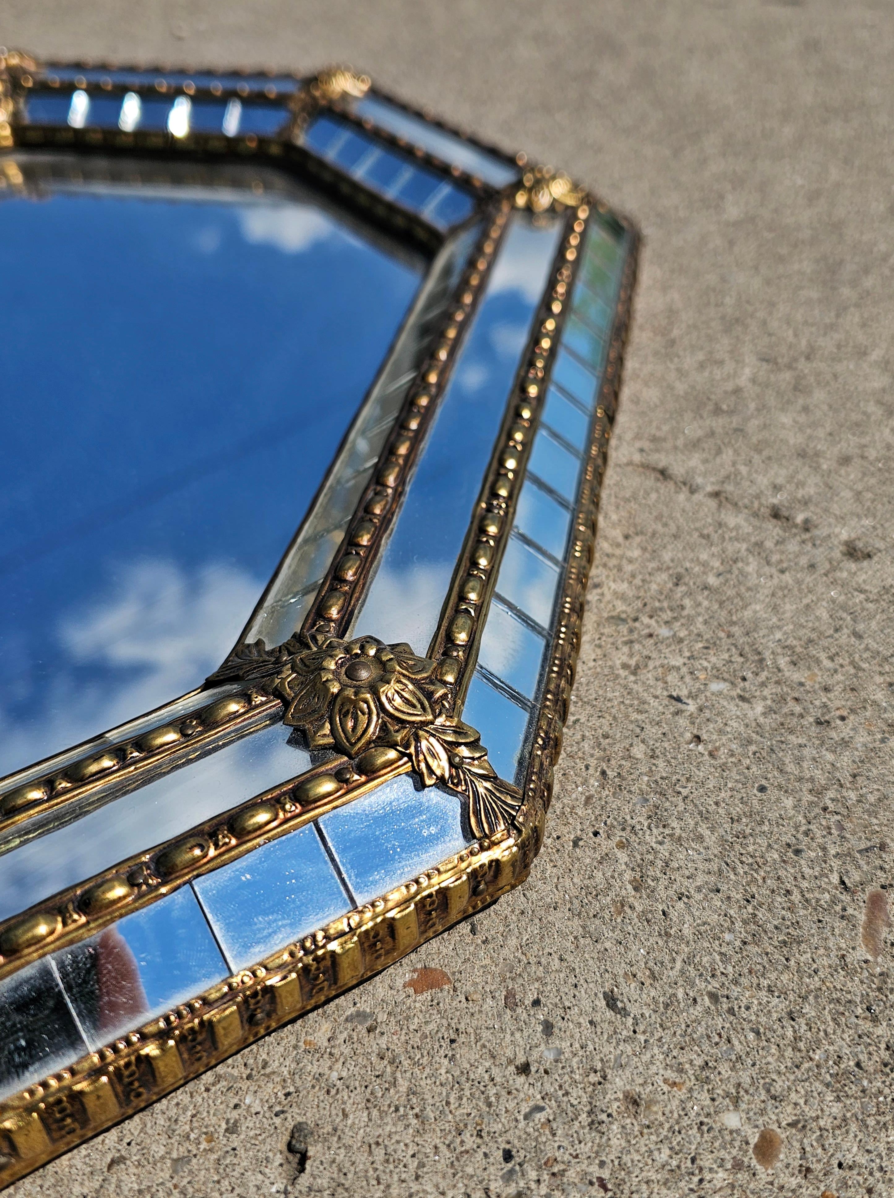 Late 20th Century Hollywood Regency Octagonal Mirror with Brass Floral Accent, Italy 1970s For Sale