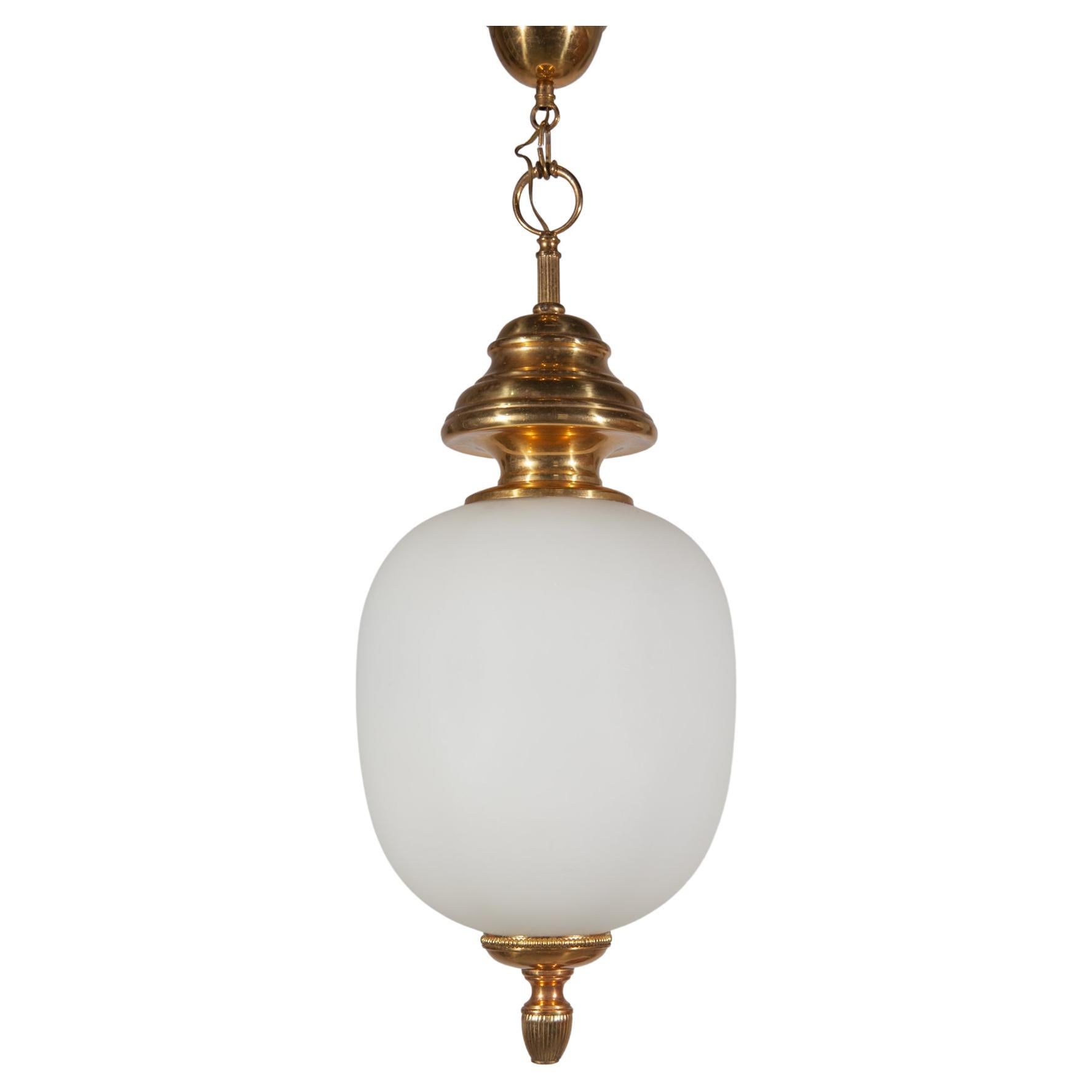 1950s 'China' pendant lamp, in style designed of Luigi Caccia Dominioni. Opaline glass diffuser and brass bottom cap and brass top and stem. Excellent original condition. 


   