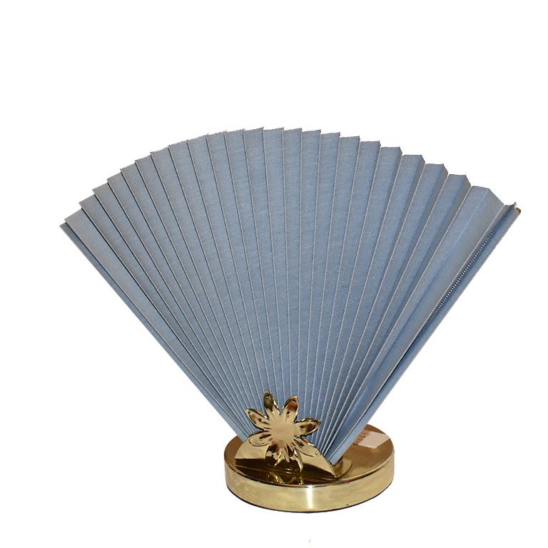 Abstract, Mid-Century Modern, chinoiserie or Hollywood Regency style light French blue accordion fan table lamp with gold floral motif at base. Reminiscent of Caprani style lighting, this beautiful French blue fan lamp is a statement piece that