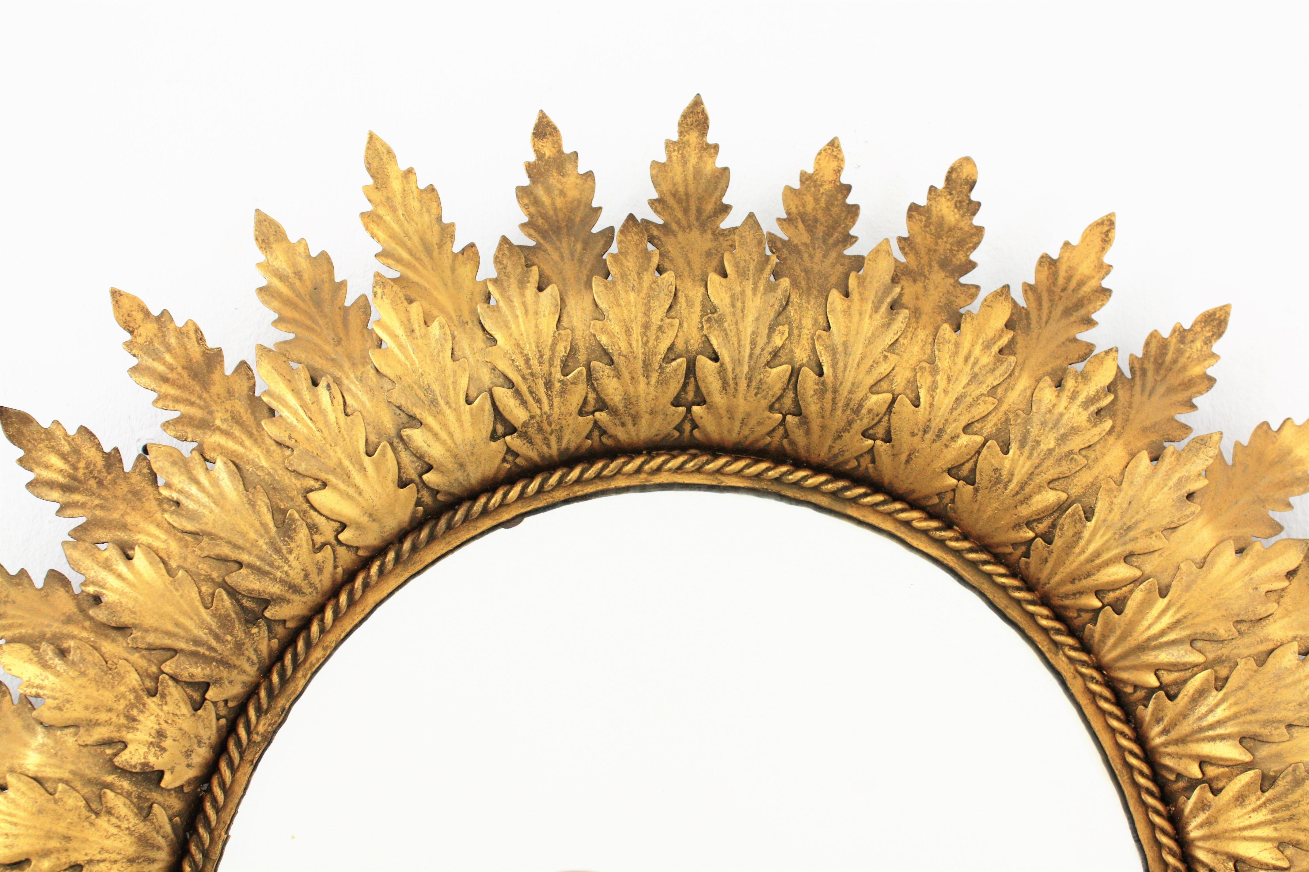 Hollywood Regency Oval Gilt Metal Leafed Sunburst Mirror, Spain, 1950s 4