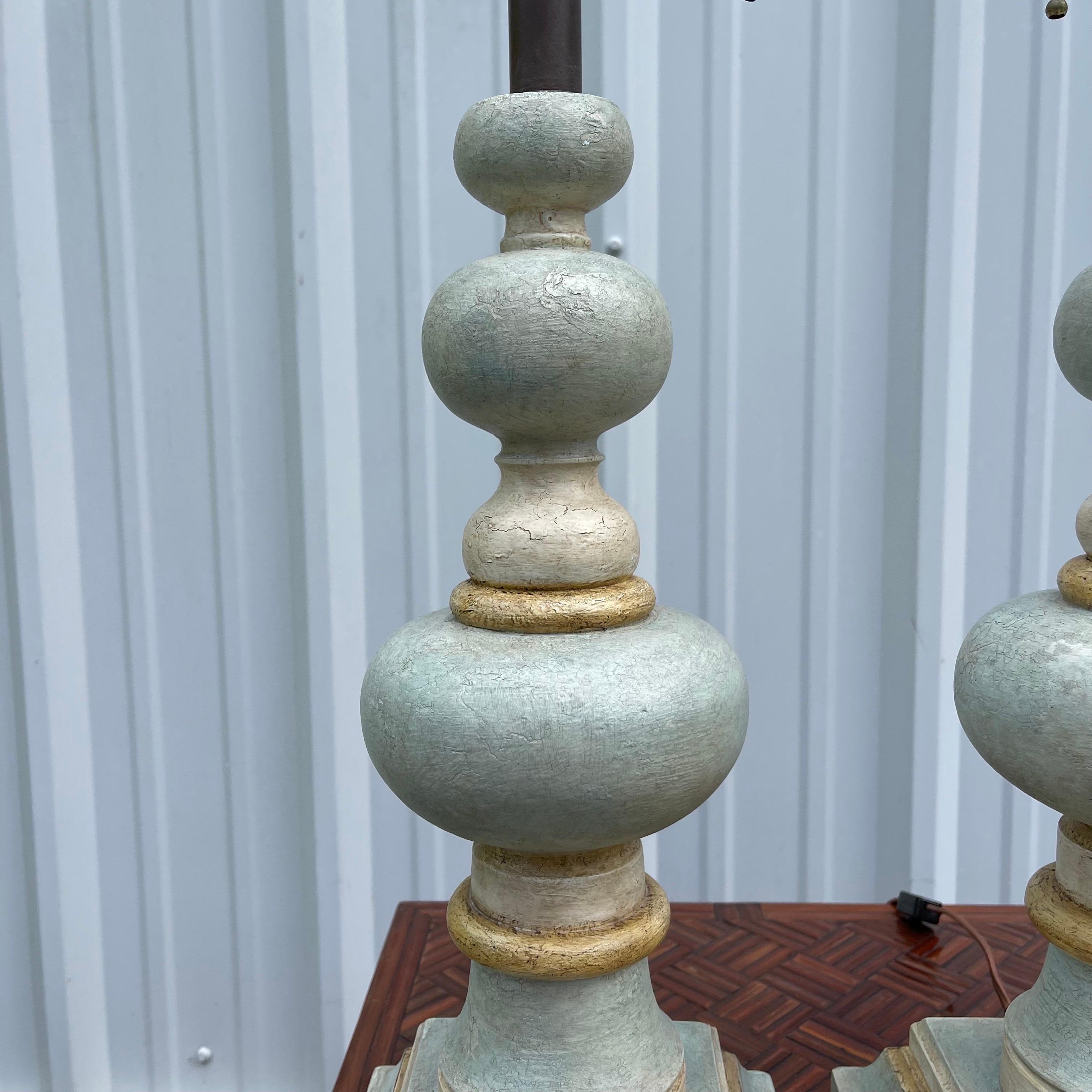 Hollywood Regency Painted Patinated Carved Wood Bobbin Tables Lamps, a Pair In Good Condition For Sale In Jensen Beach, FL