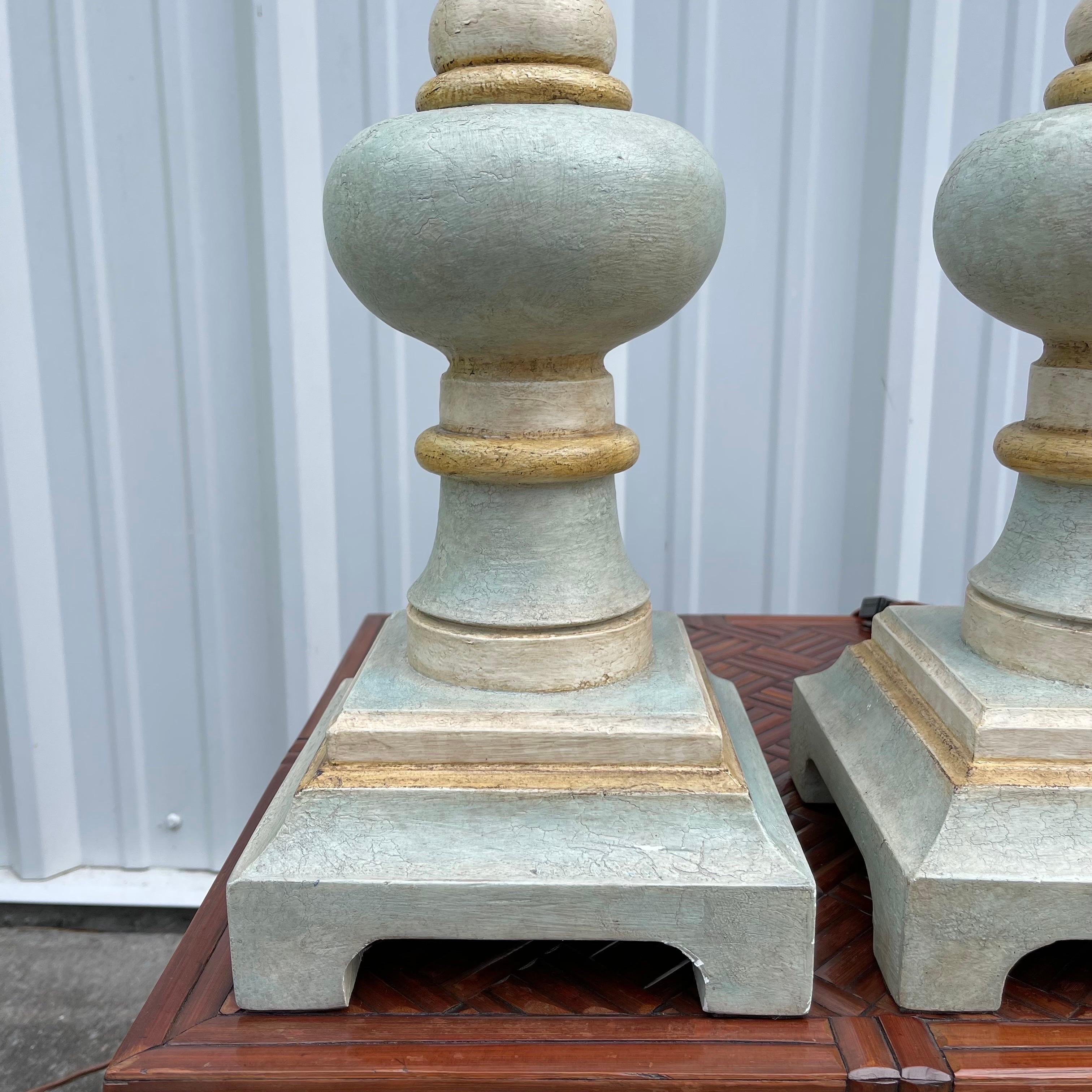 20th Century Hollywood Regency Painted Patinated Carved Wood Bobbin Tables Lamps, a Pair For Sale