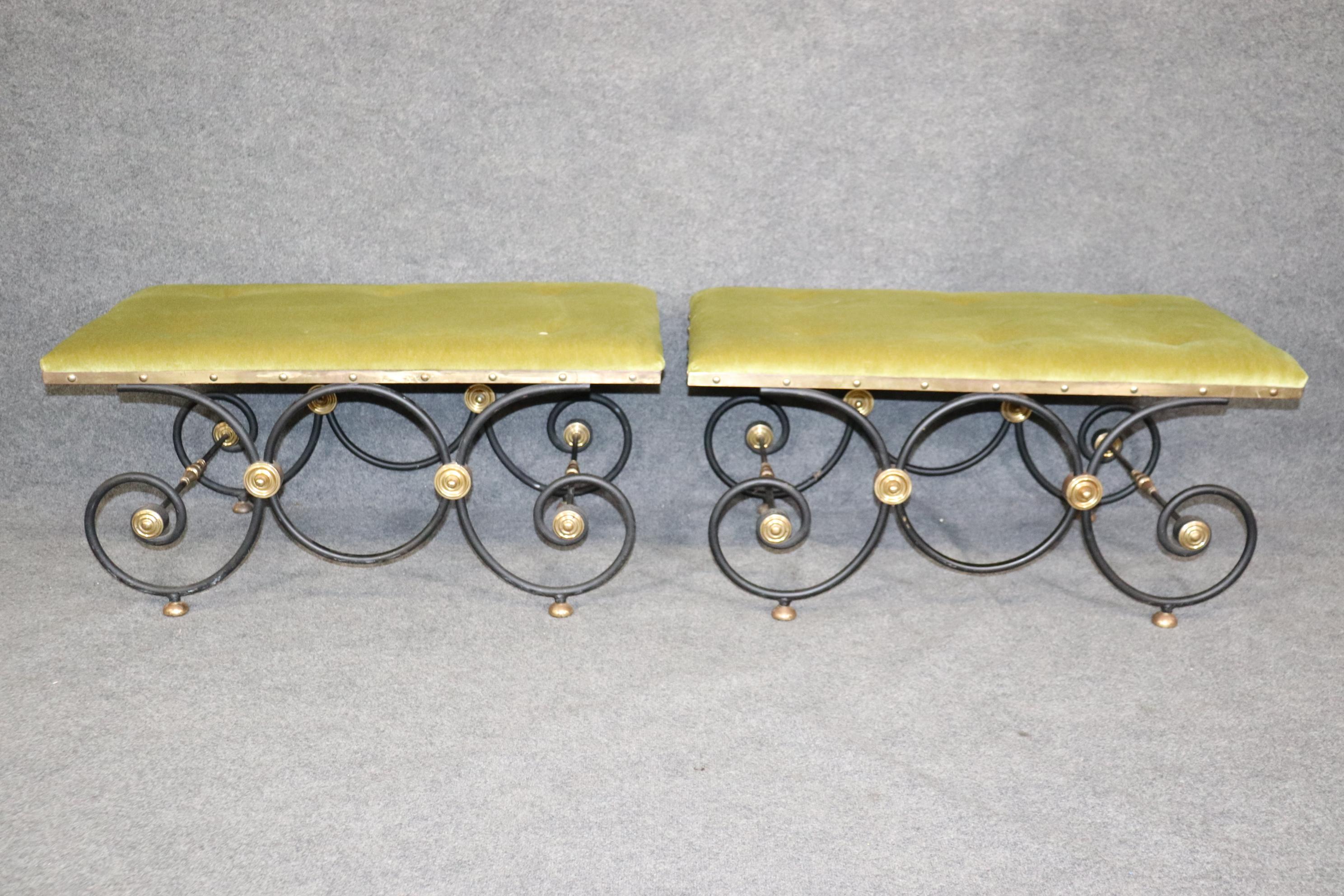 This Hollywood Regency Pair of Aged Brass and Iron Upholstered Benches Attributed to Maison Jansen have a luxurious and minimalistic look and are perfect if you are looking to bring a sense of luxury and sophistication into your home or place of