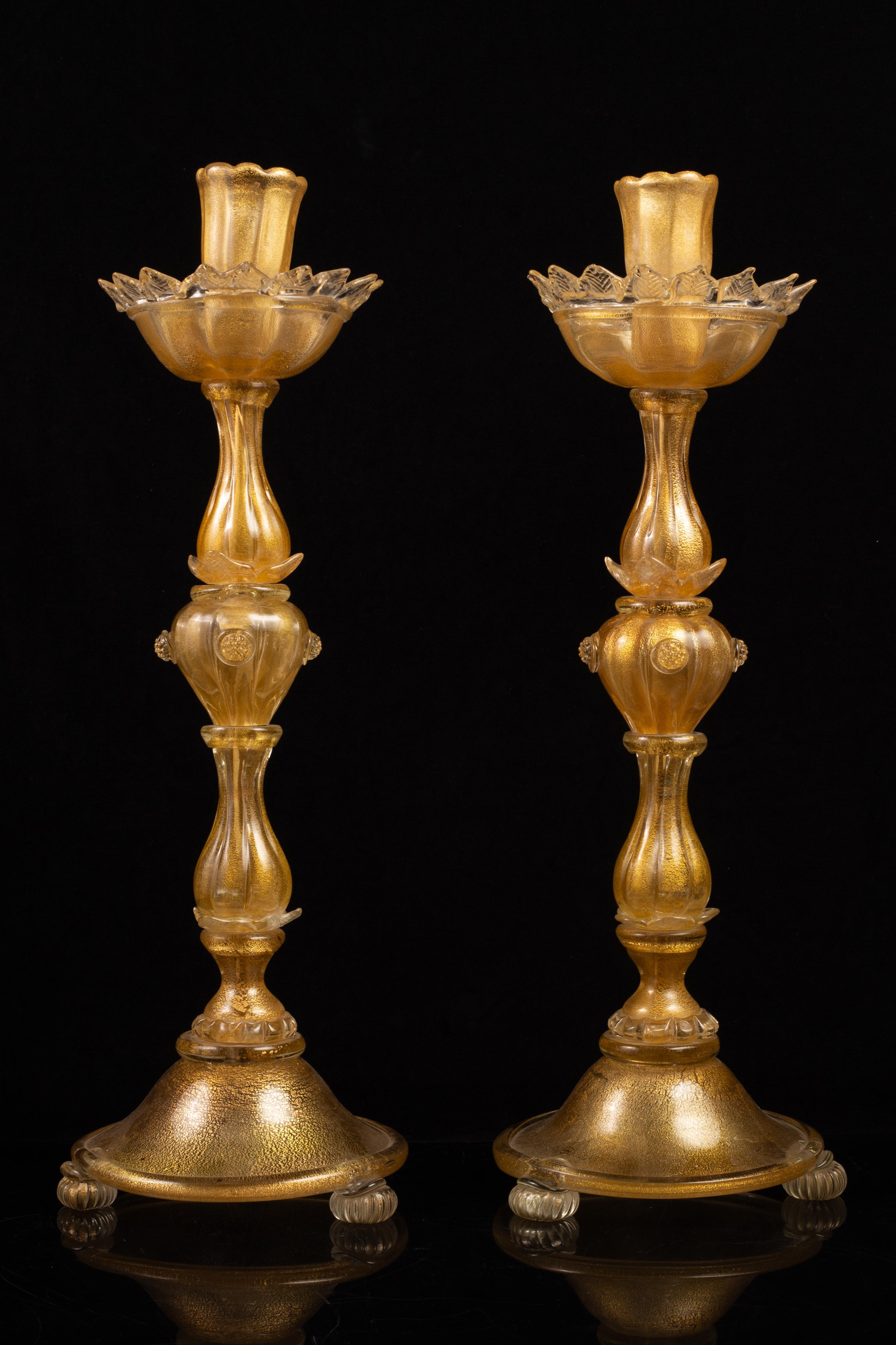 Mid-20th Century Hollywood Regency Pair of Italian Murano Gold Speckled Flower Form Candlesticks For Sale