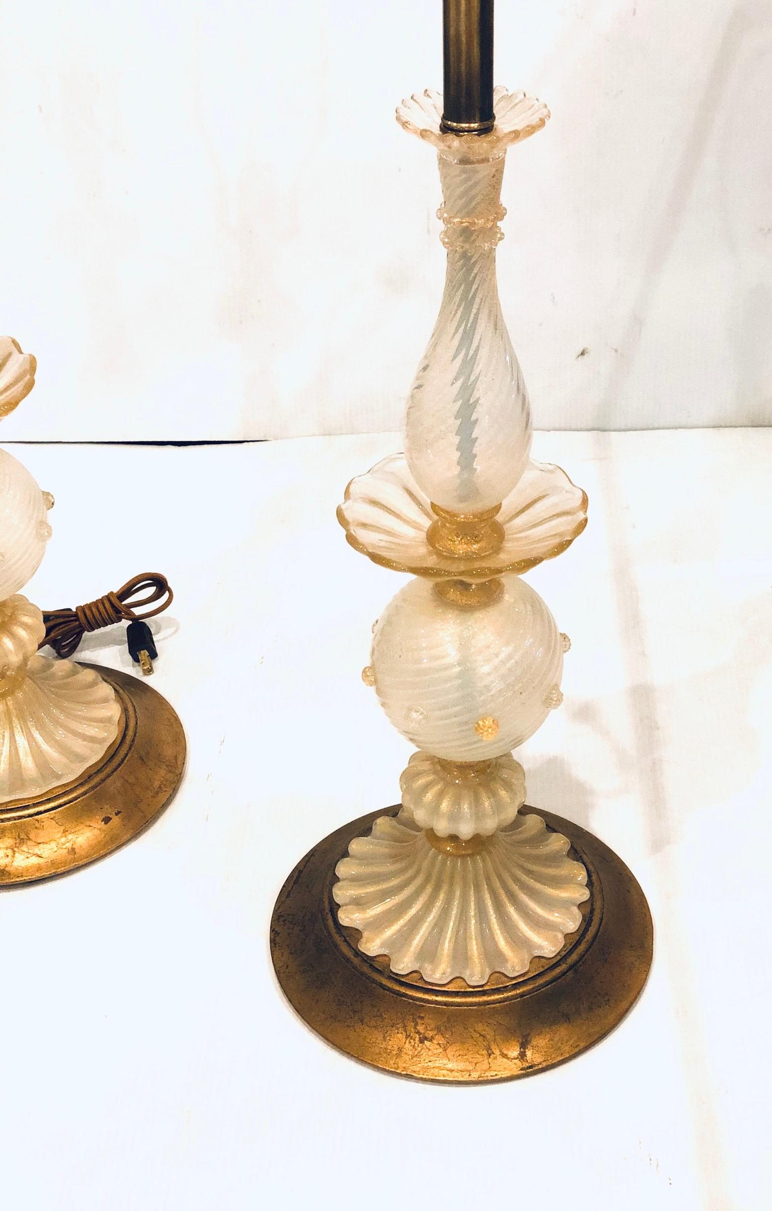 Italian Hollywood Regency Pair of Tall Murano Lamps with Gold Leaf Bases For Sale