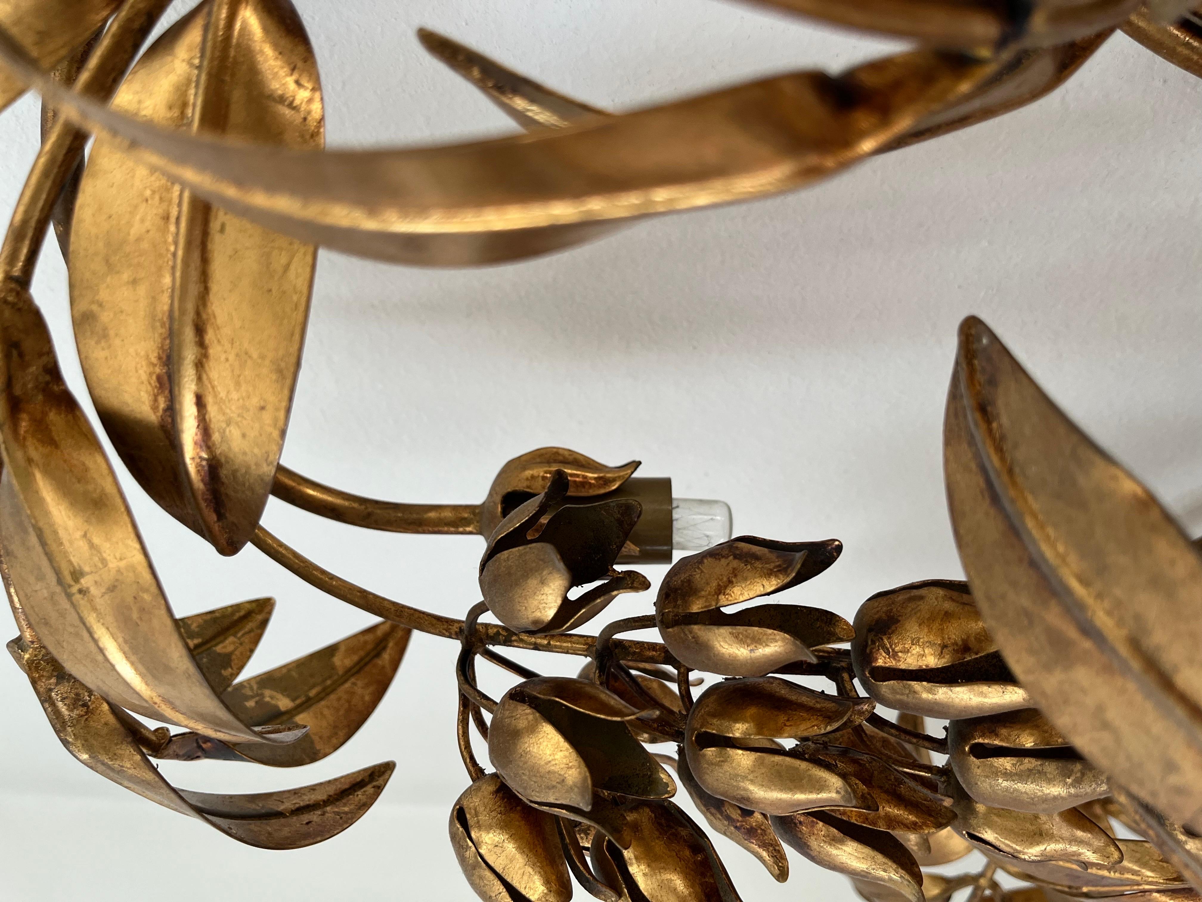 Brass Hollywood Regency palm leaf wall sconce attributed to Hans Kögl For Sale