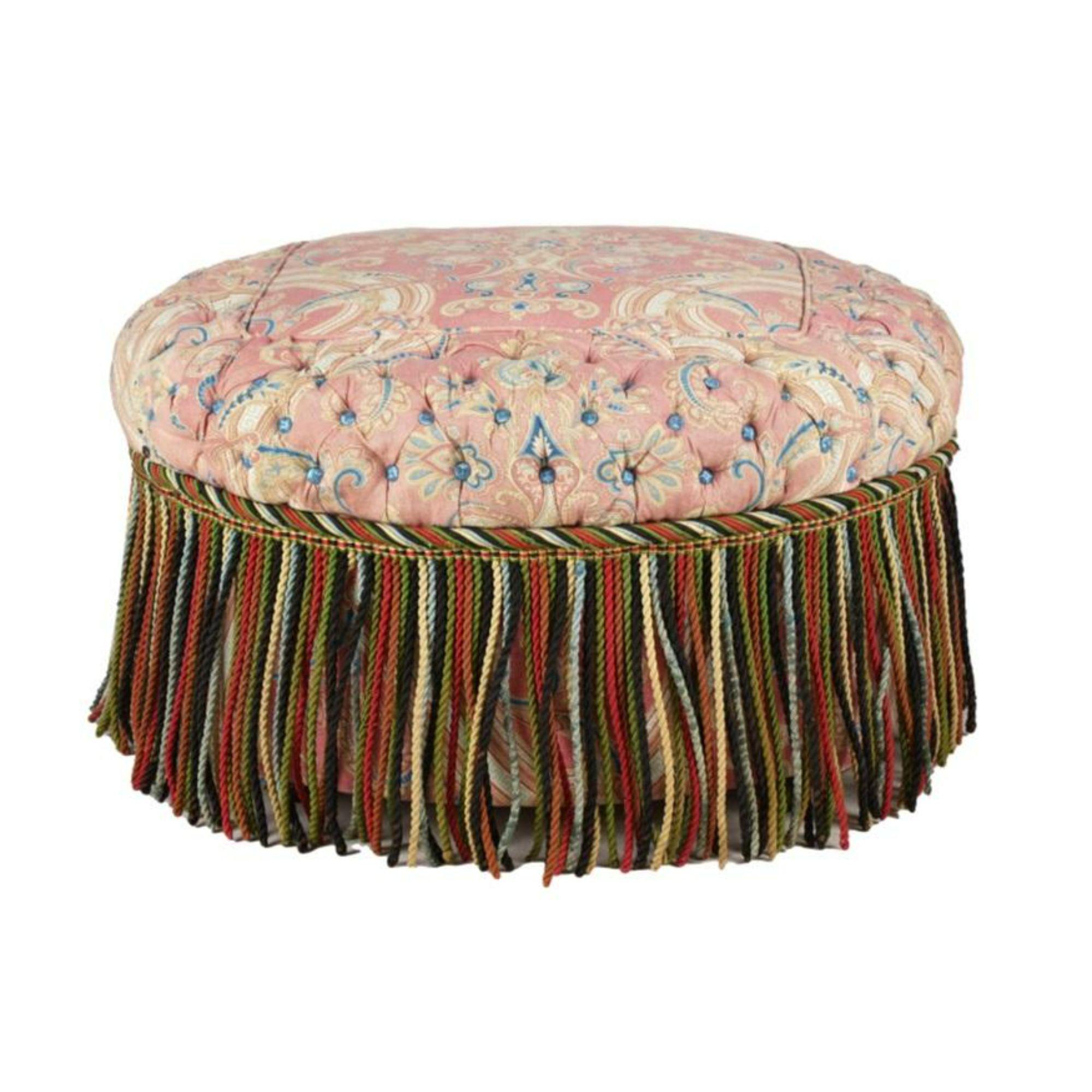 Hollywood Regency Pink Paisley Tufted Upholstered Round Ottoman. It features colorful long rope trim with tufted edges in Pink Paisley designer fabric

Additional information: 
Materials: CottonLinenWood
Color: Pink
Period: 1990s
Styles: Hollywood