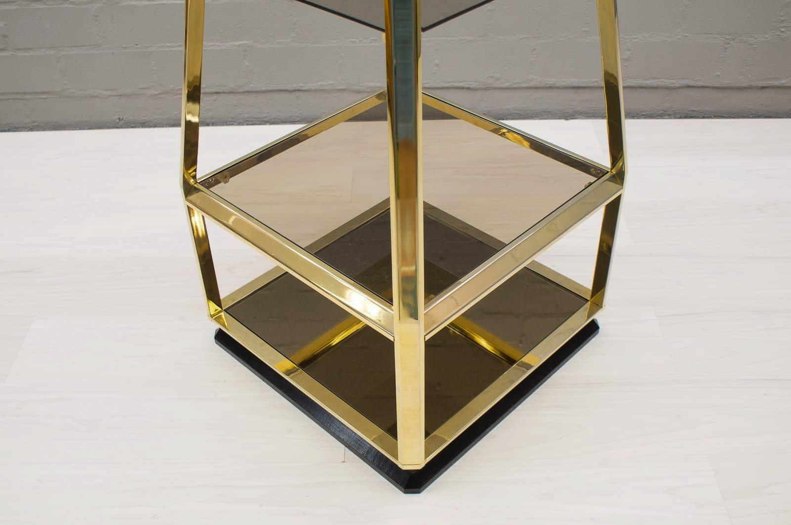 French Hollywood Regency Pyramid Shelf in Gold and Smoked Glass, France 1960s For Sale