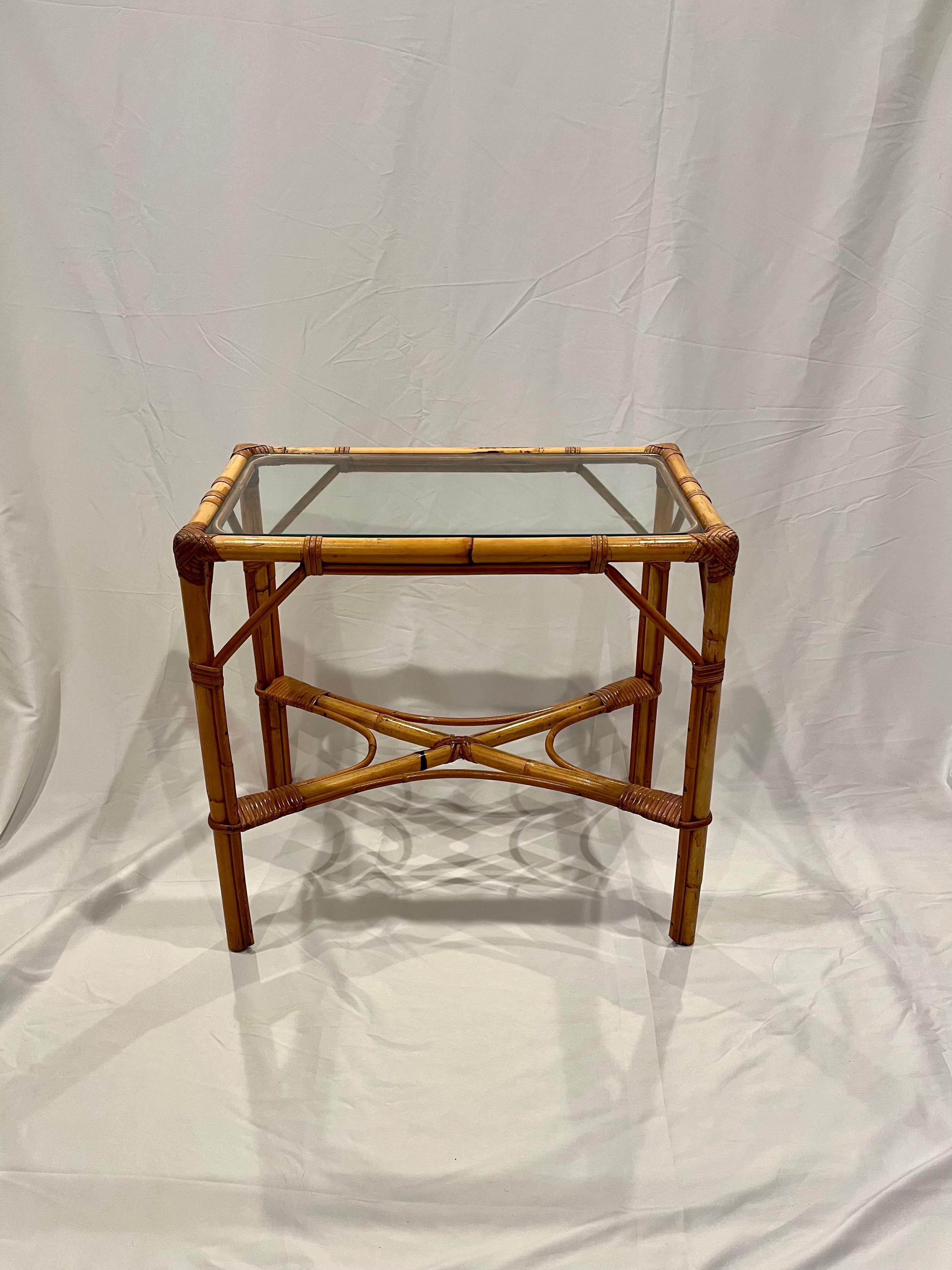 Splendid rattan side table with glass top. Great proportions and wrappings with x base stretcher. Simple yet sophisticated.
Curbside to NYC/Philly $400