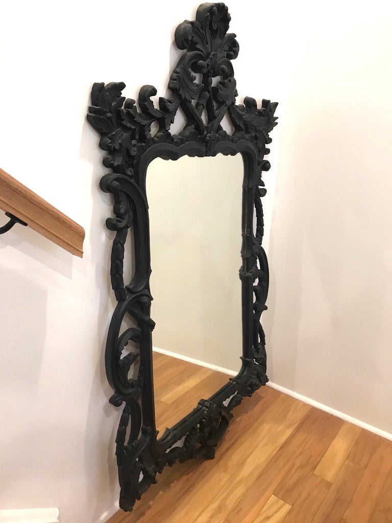 Italian Hollywood Regency Rococo Mirror with Carved Wood Frame in Black, Italy C. 1970's For Sale