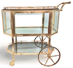 Hollywood Regency Rolling Bar / Tea wagon Cart in Glass Bronze & Brass
