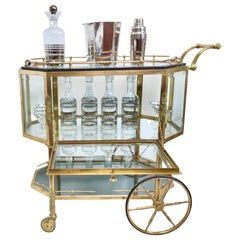 Hollywood Regency Rolling Bar / Tea wagon Cart in Glass Bronze & Brass