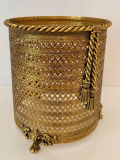 Hollywood Regency Rope and Tassel Gold Metal Filigree Wastebasket with Claw Feet