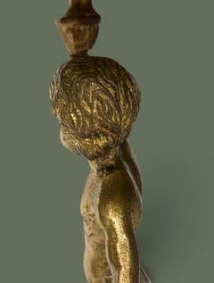 Mesa de centro redonda de estilo Hollywood Regency, con putti de ónix y bronce dorado, década de 1960