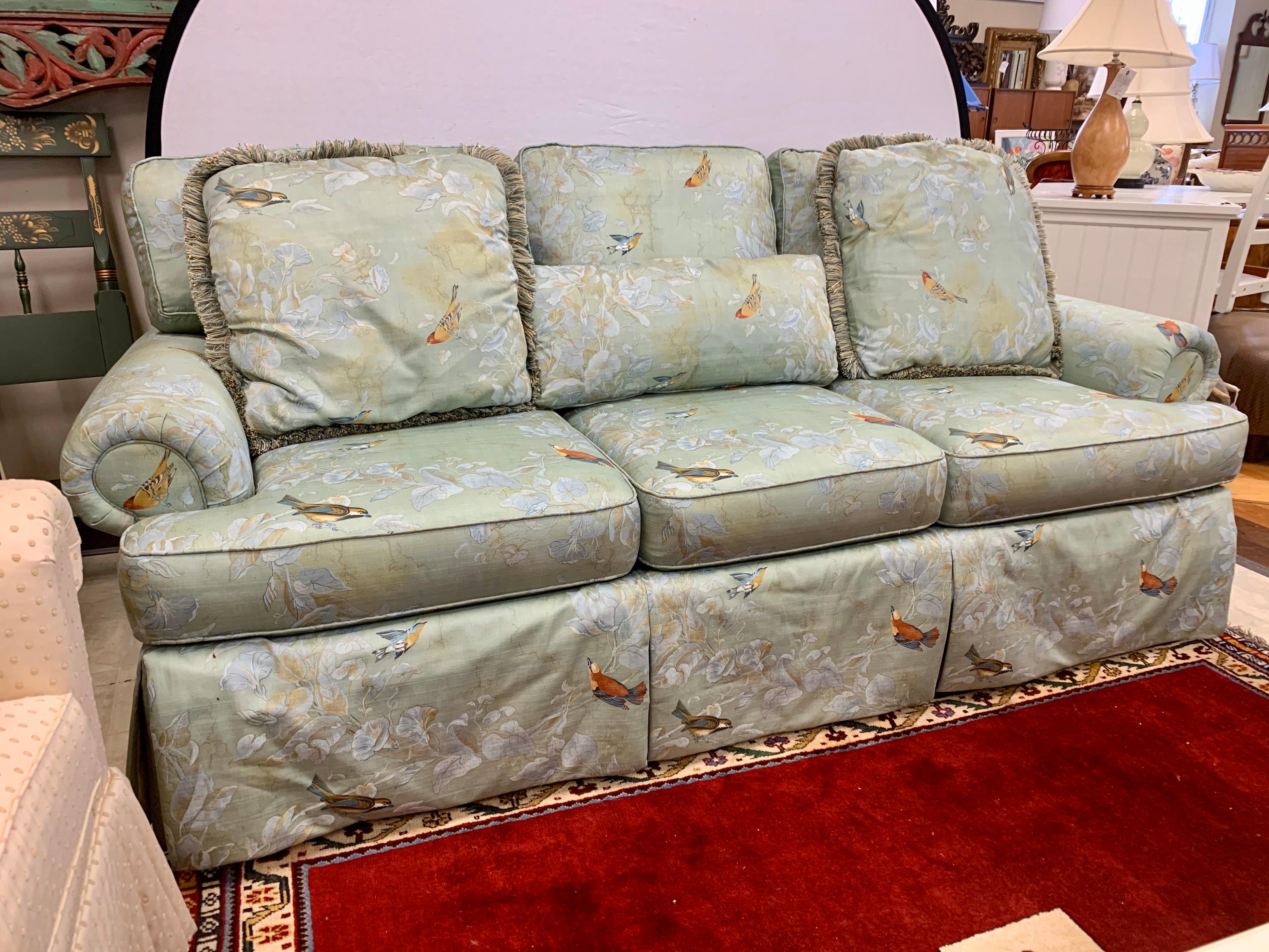 Beautiful and pristine seven foot upholstered sofa by Sherrill upholstered in a chinoiserie style chintz fabric in a robin’s egg blue with birds and flowers.
Made in North Carolina, USA and in great condition.