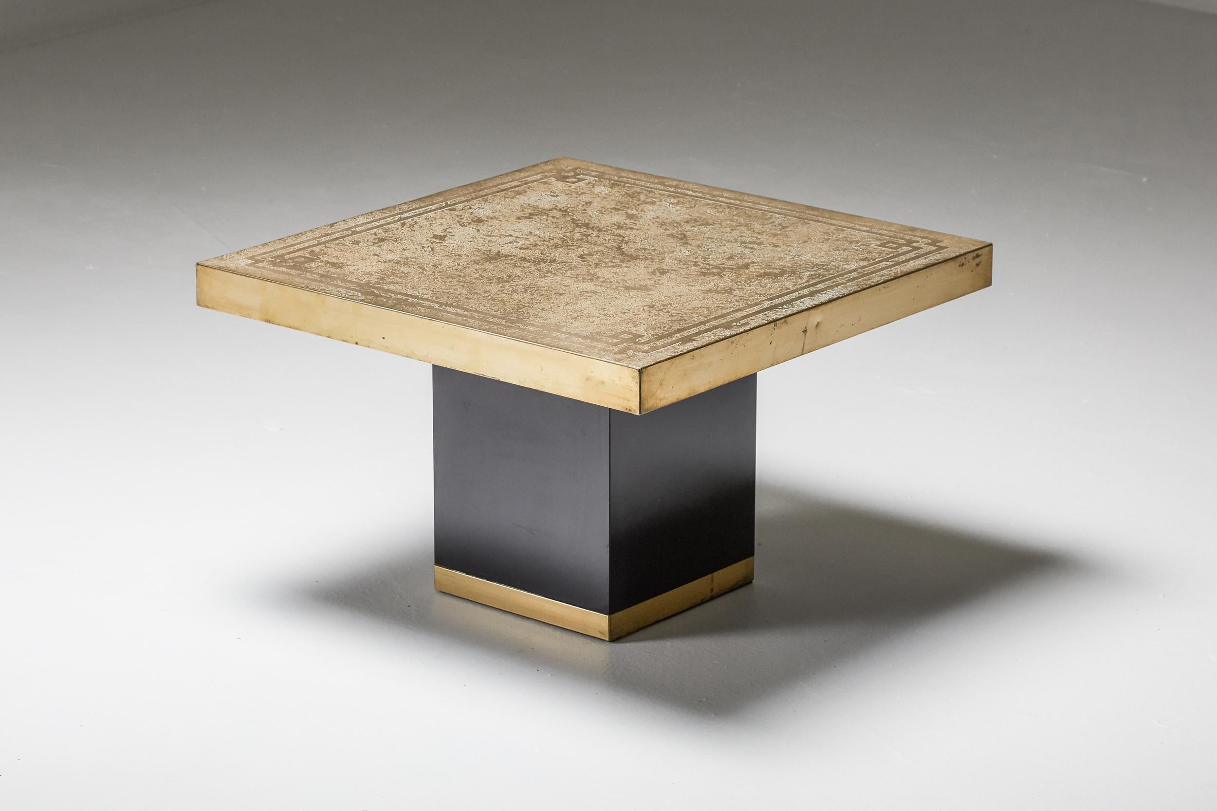 Brass Etched; Hollywood Regency; Side Table; Italy; 1950s; Mid Century Modern; Italian Design; Italy; Coffee Table;

This design reflects an elegant combination of an etched brass top with a black shiny base. The square top rests on the rectangular